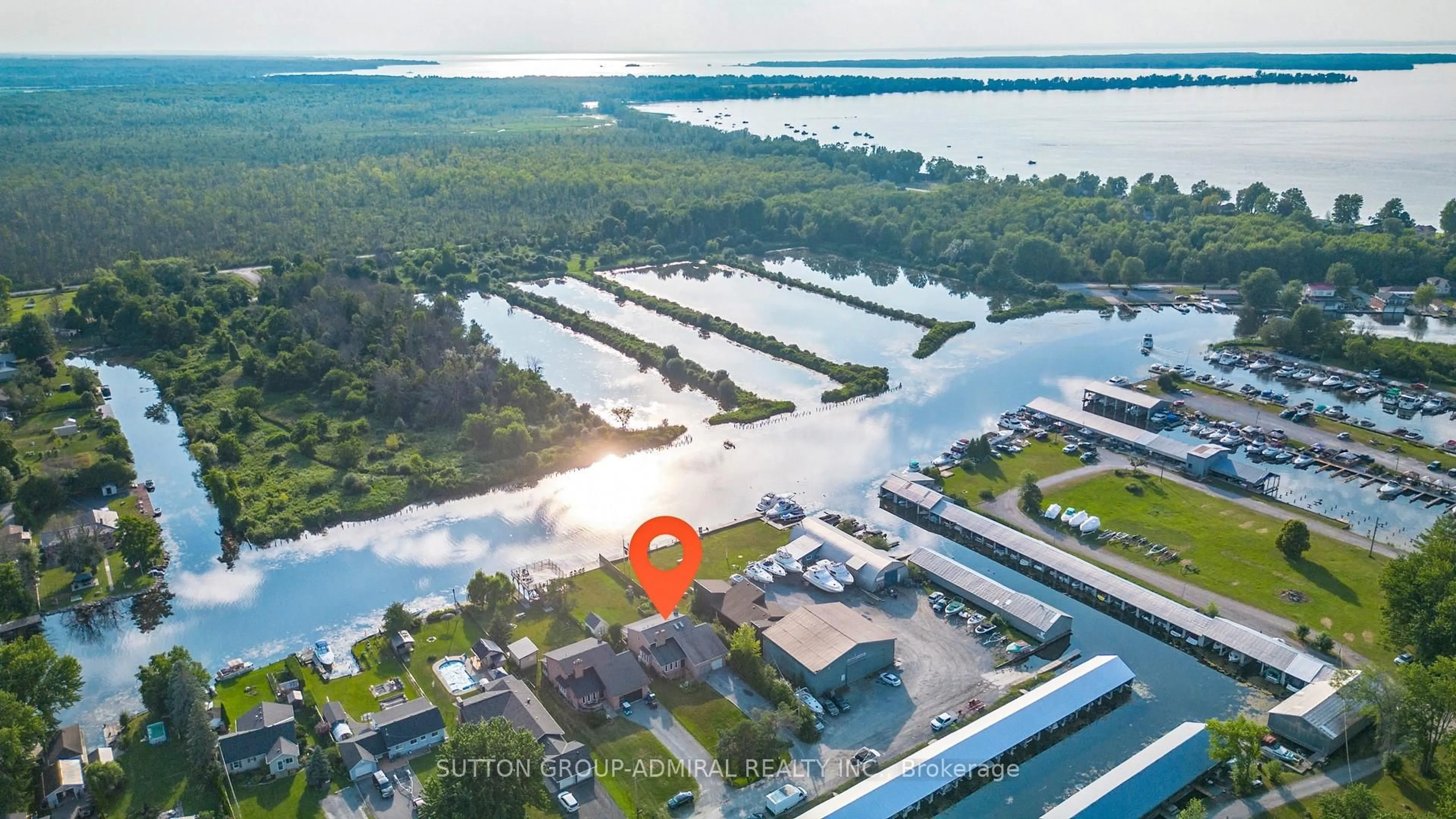 A pic from outside/outdoor area/front of a property/back of a property/a pic from drone, water/lake/river/ocean view for 52 Riverside Dr, Georgina Ontario L0E 1N0