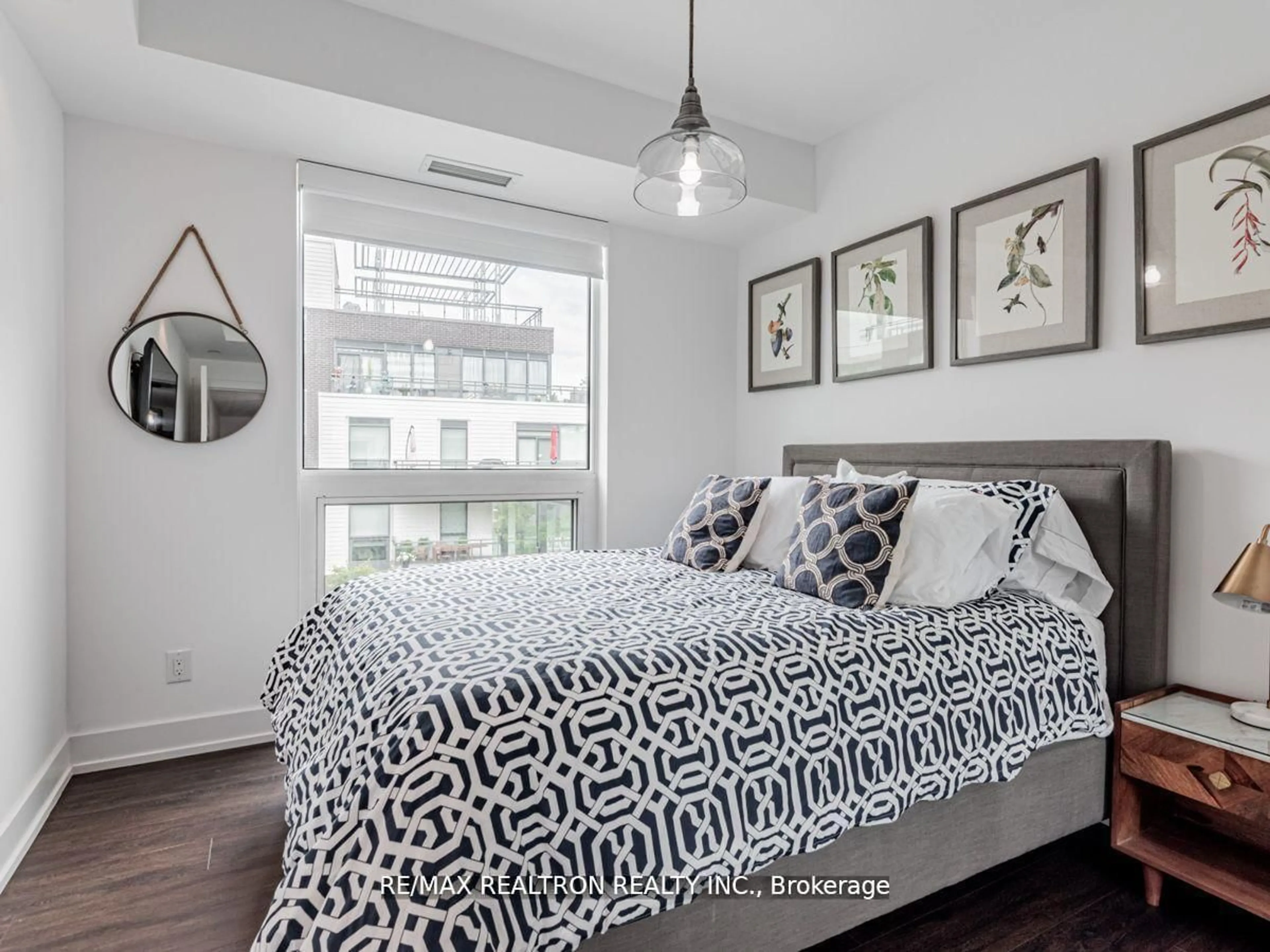 Bedroom with bed, wood/laminate floor for 271 Sea Ray Ave #B307, Innisfil Ontario L9S 0L8