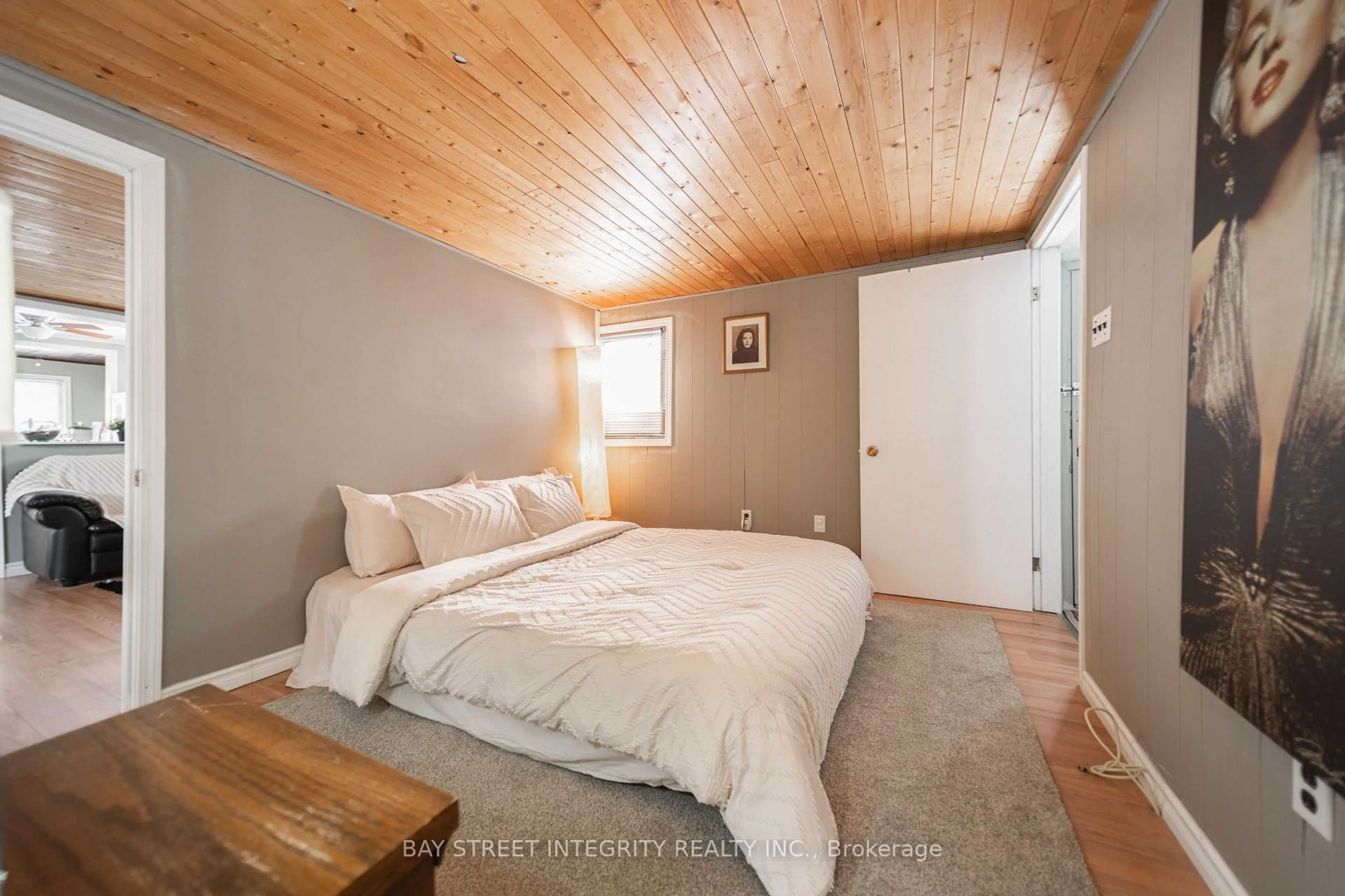 Bedroom with bed, wood/laminate floor for 74 De La Salle Blvd, Georgina Ontario L0E 1S0
