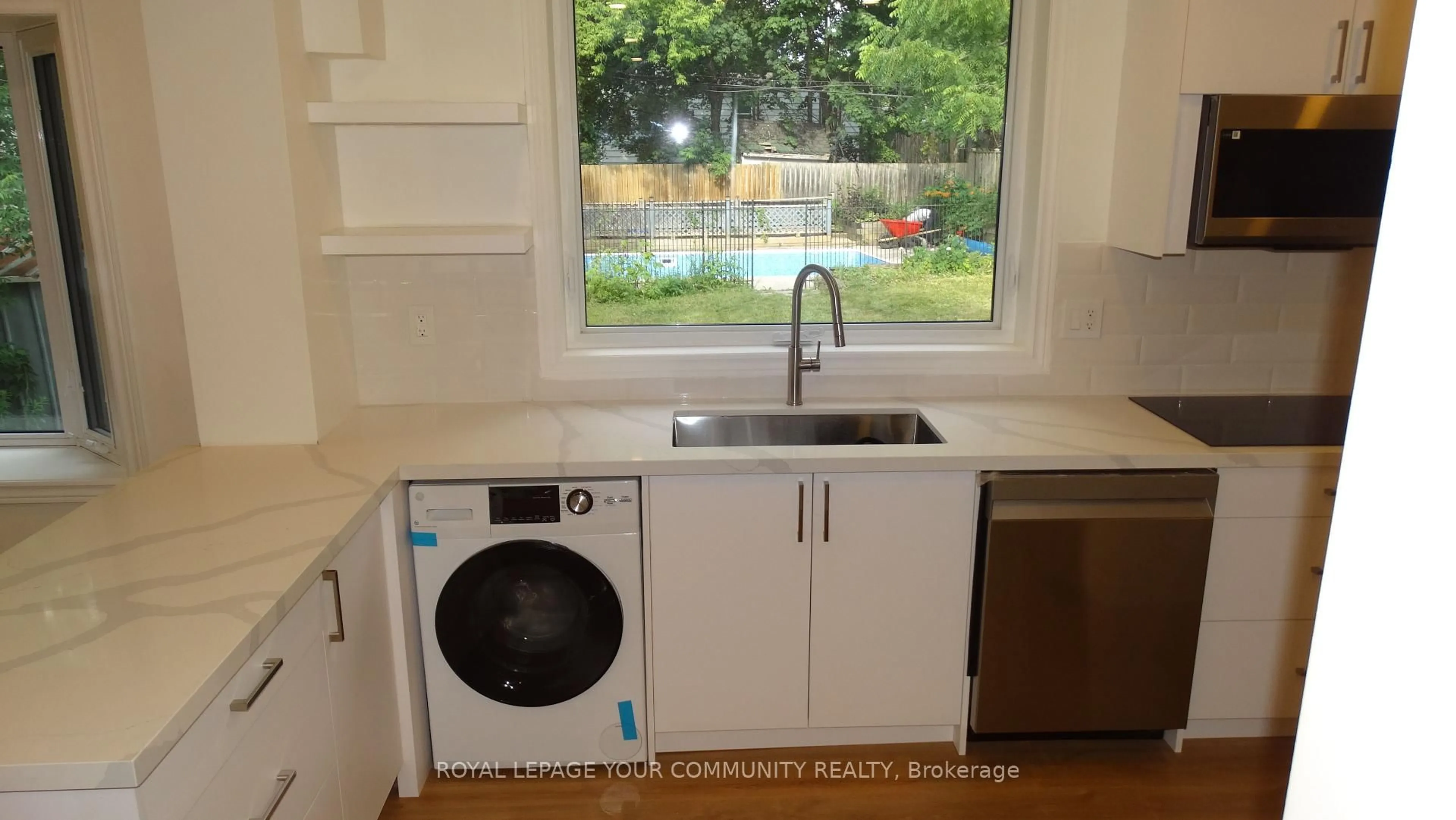 Kitchen with laundary machines, unknown for 83 Lundy's Lane, Newmarket Ontario L3Y 3R9