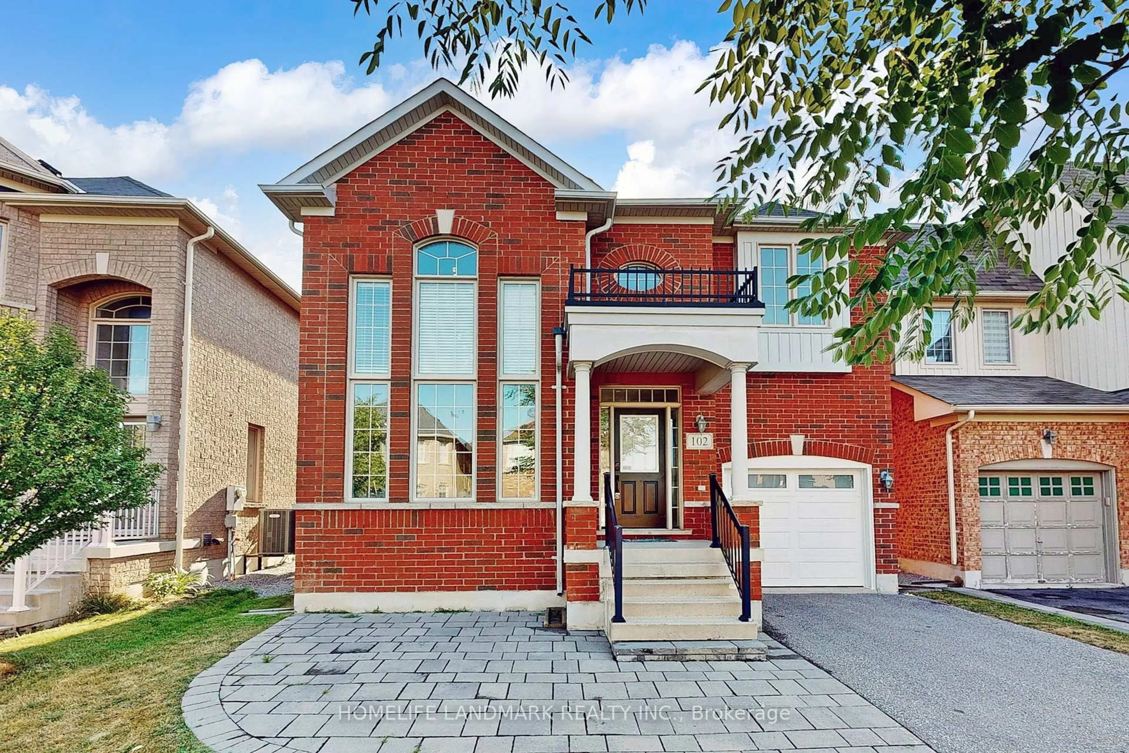 Home with brick exterior material, street for 102 Evershot Cres, Markham Ontario L6E 0L6