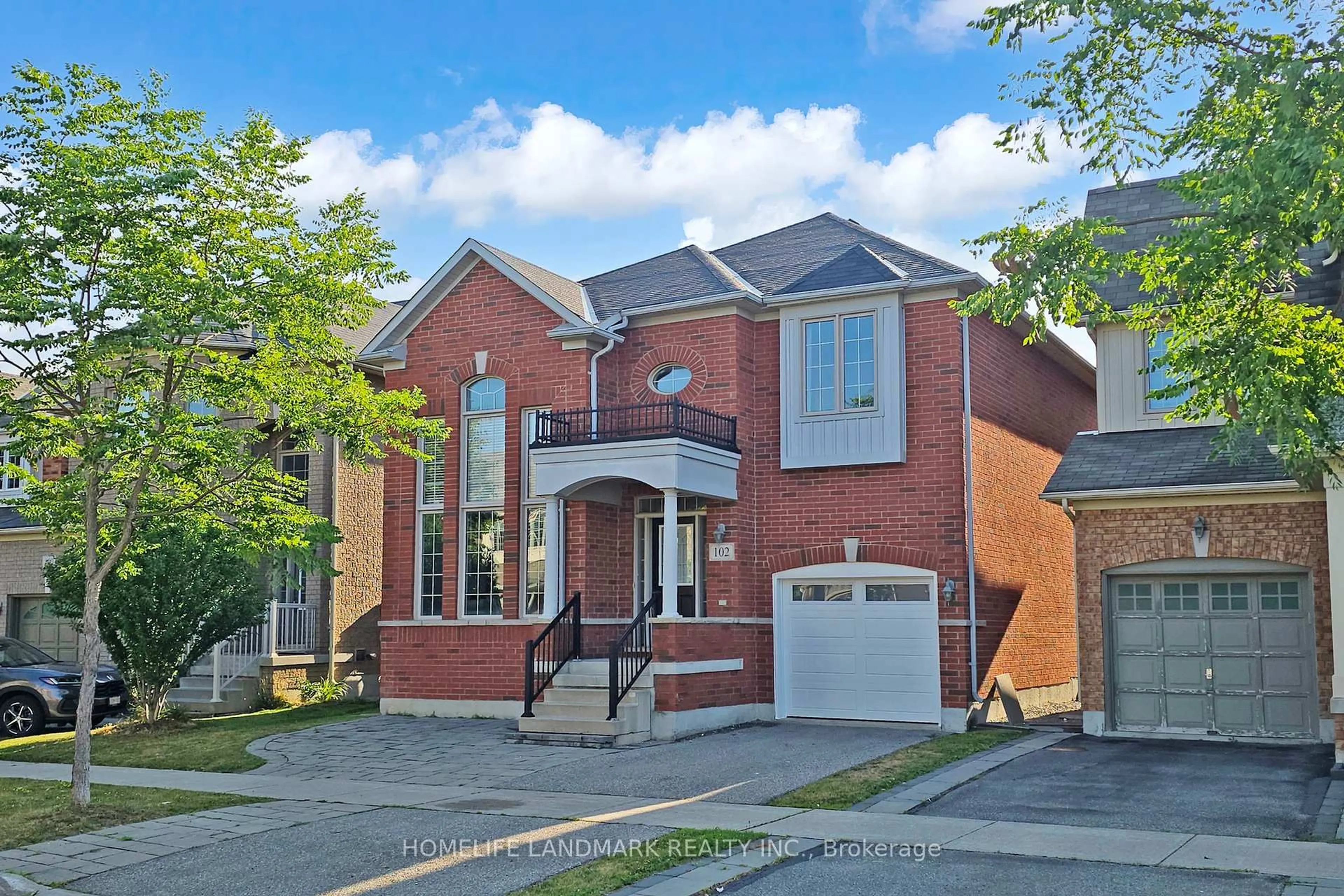 Home with brick exterior material, street for 102 Evershot Cres, Markham Ontario L6E 0L6