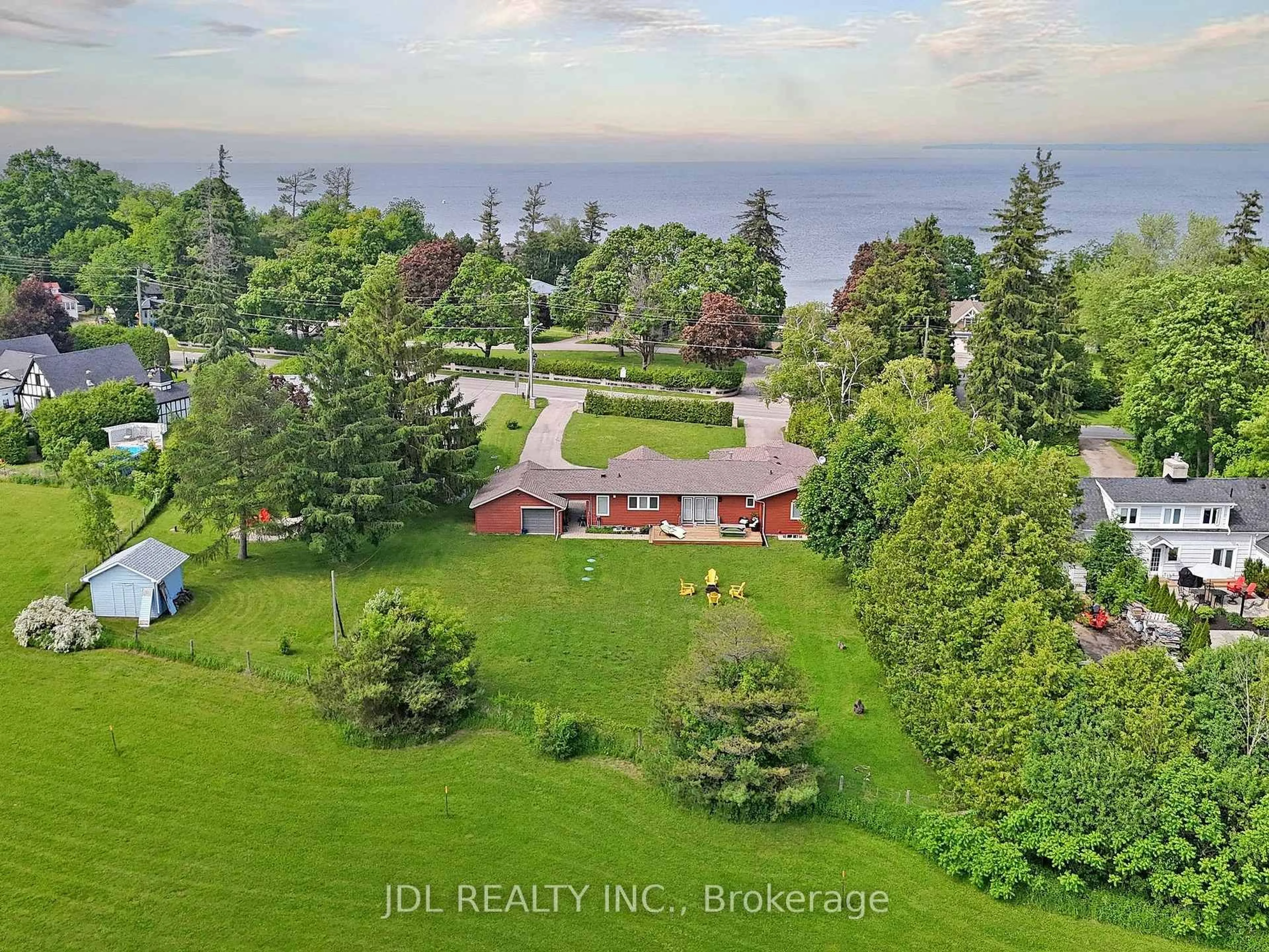 A pic from outside/outdoor area/front of a property/back of a property/a pic from drone, water/lake/river/ocean view for 11 Hedge Rd, Georgina Ontario L0E 1R0