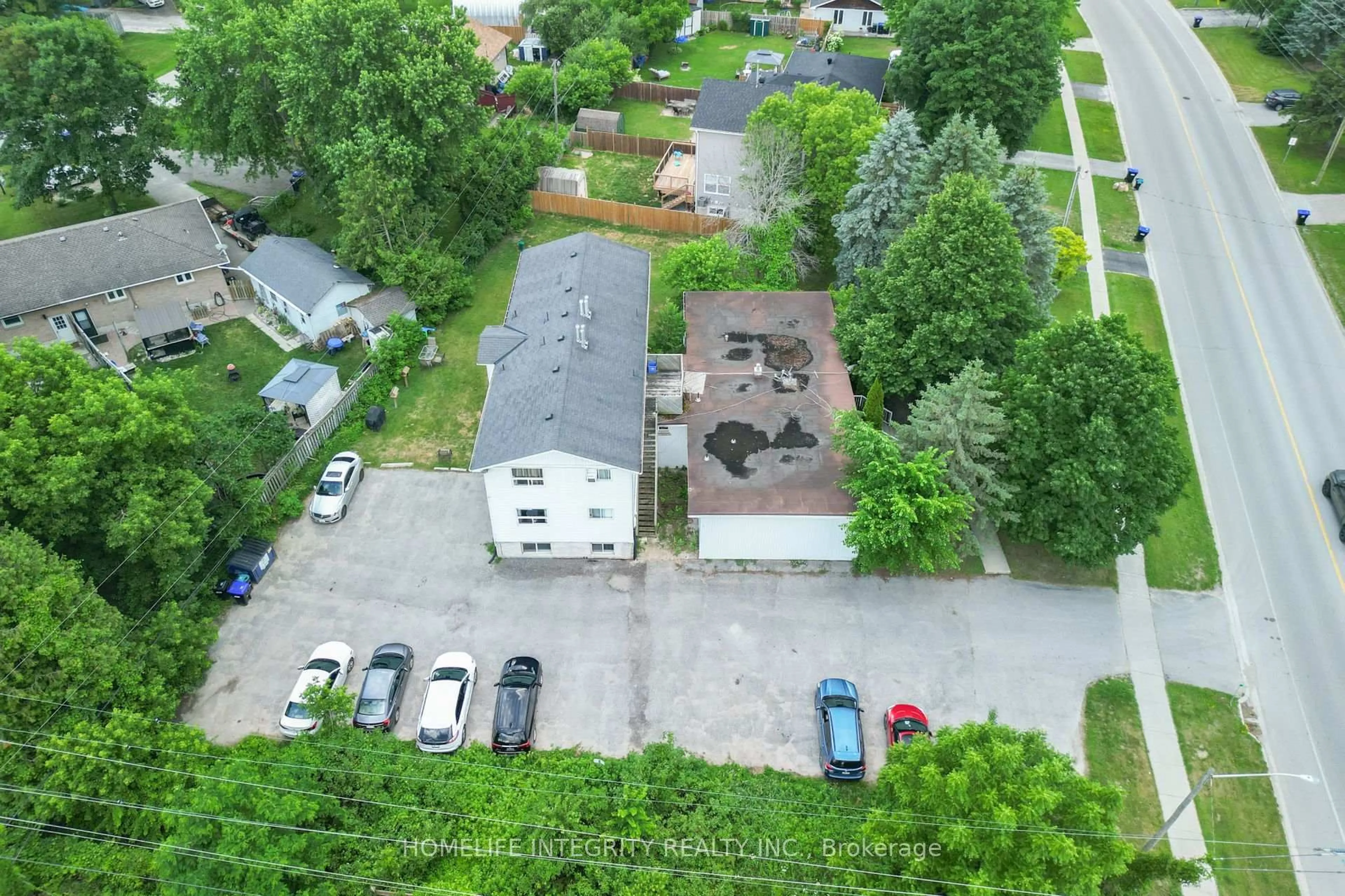 A pic from outside/outdoor area/front of a property/back of a property/a pic from drone, street for 254 Centre St, Essa Ontario L0M 1B2