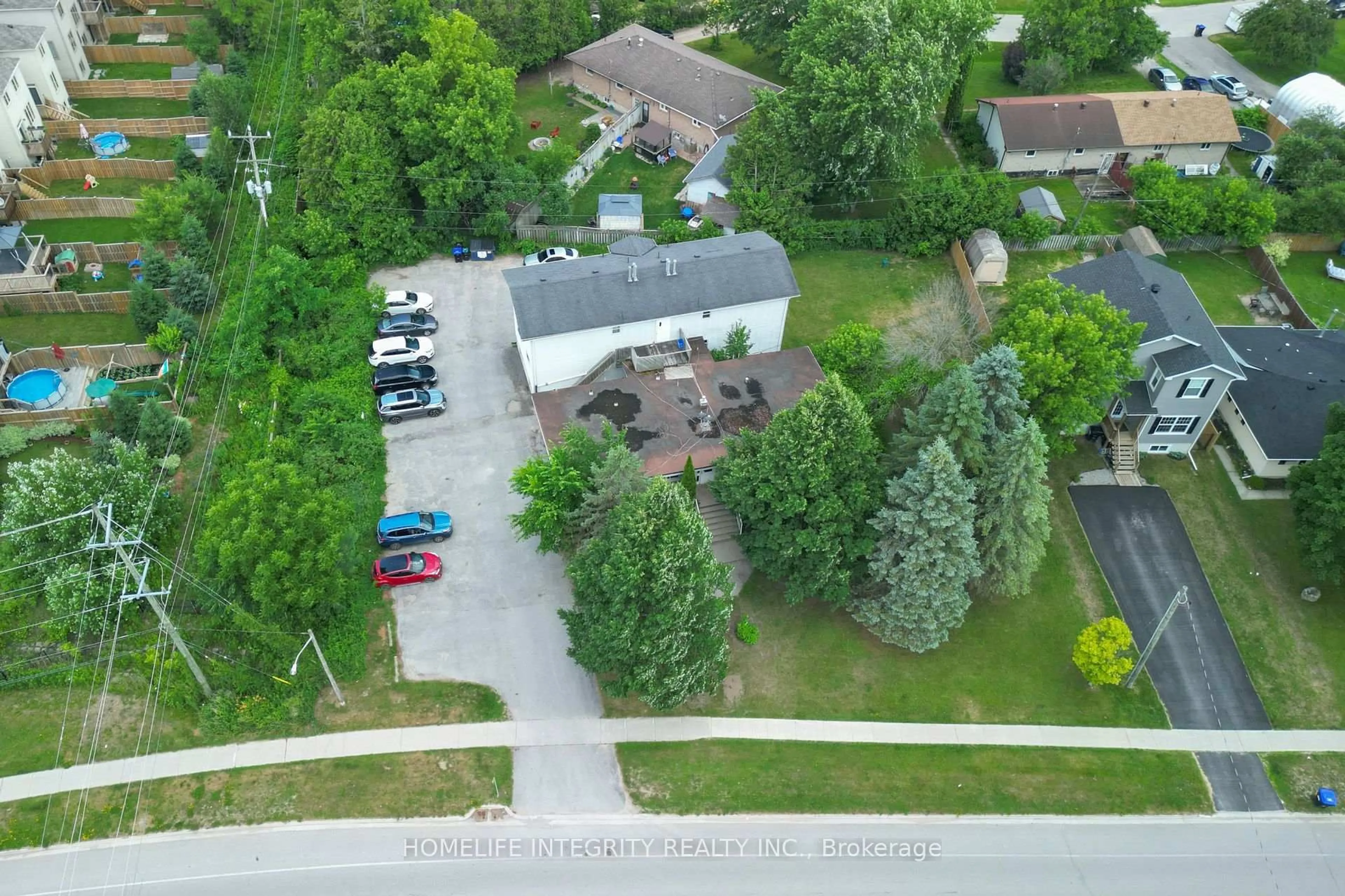 A pic from outside/outdoor area/front of a property/back of a property/a pic from drone, street for 254 Centre St, Essa Ontario L0M 1B2