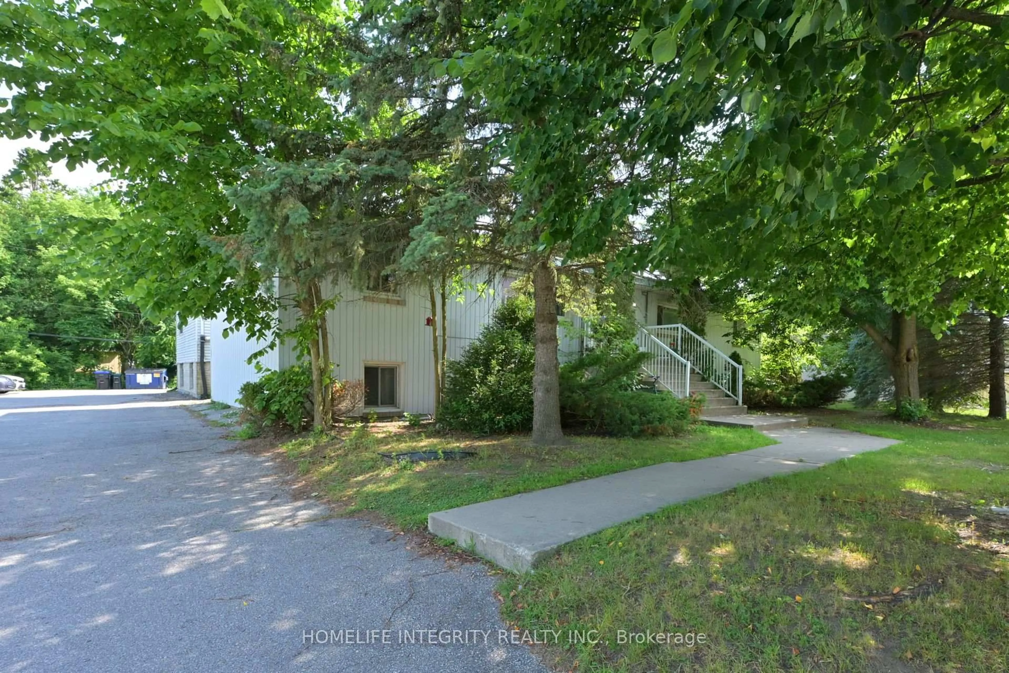 A pic from outside/outdoor area/front of a property/back of a property/a pic from drone, street for 254 Centre St, Essa Ontario L0M 1B2