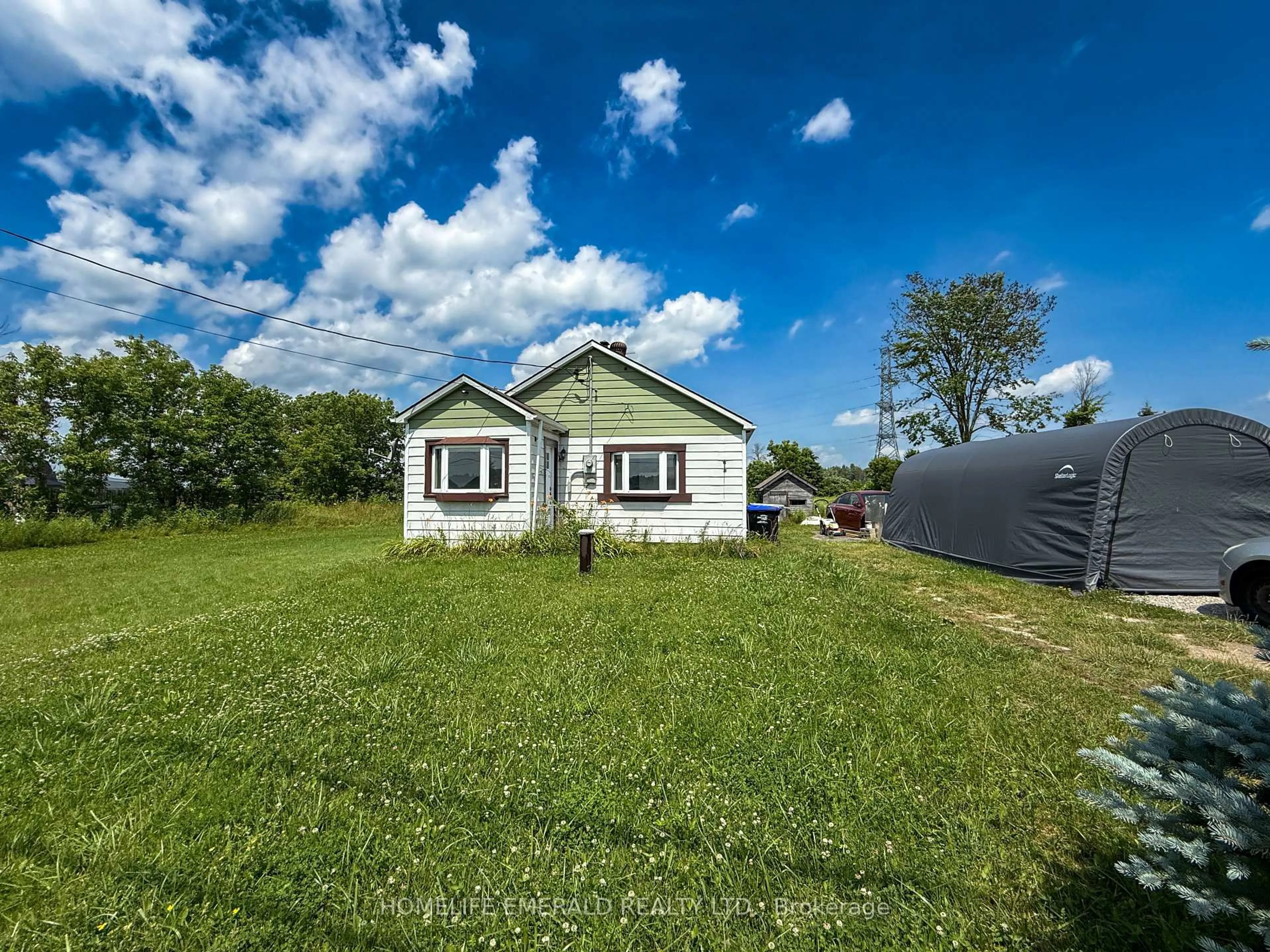 A pic from outside/outdoor area/front of a property/back of a property/a pic from drone, unknown for 6170 90 Cty Rd, Essa Ontario L0M 1B4