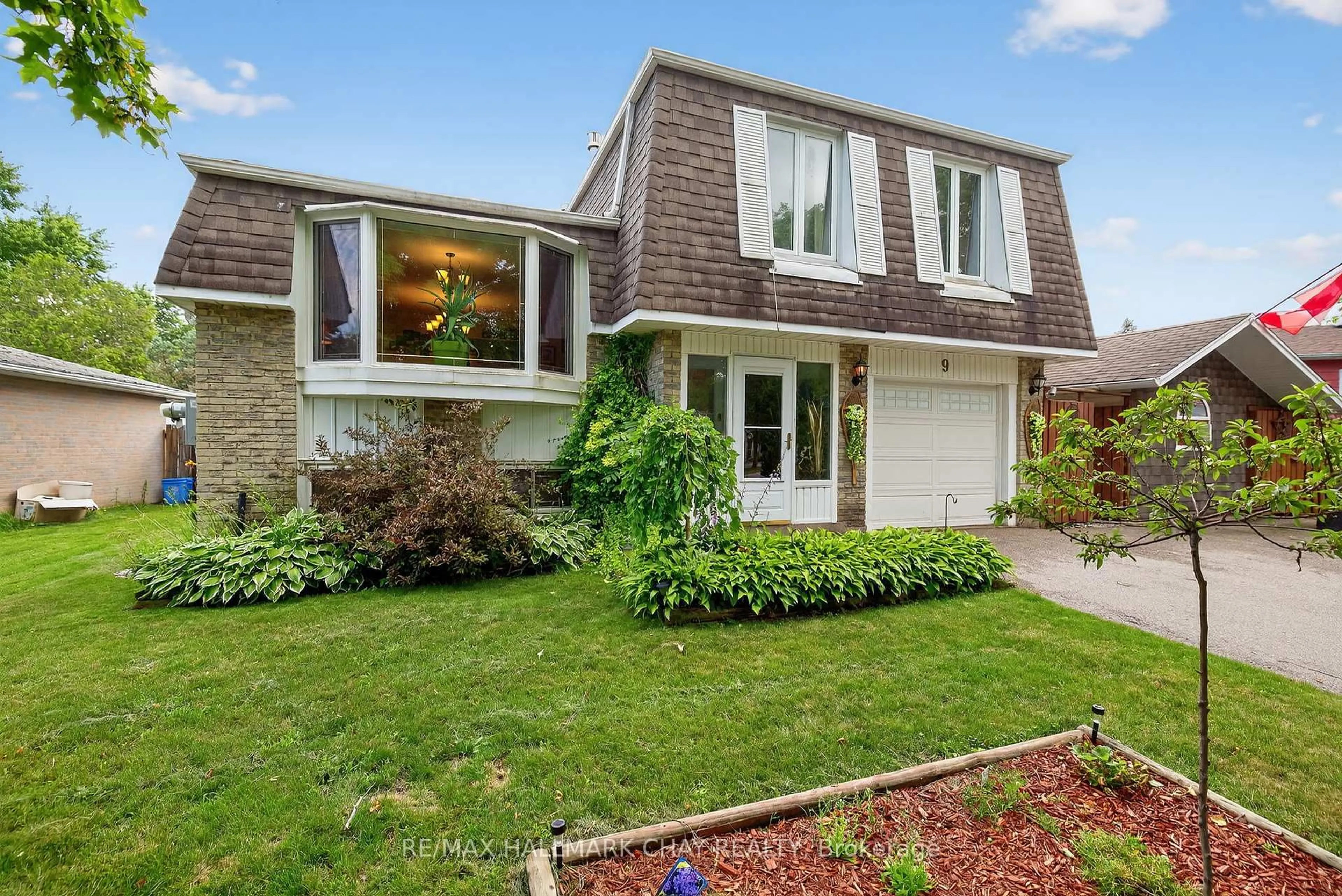Home with brick exterior material, street for 9 Hammond Cres, New Tecumseth Ontario L0G 1A0