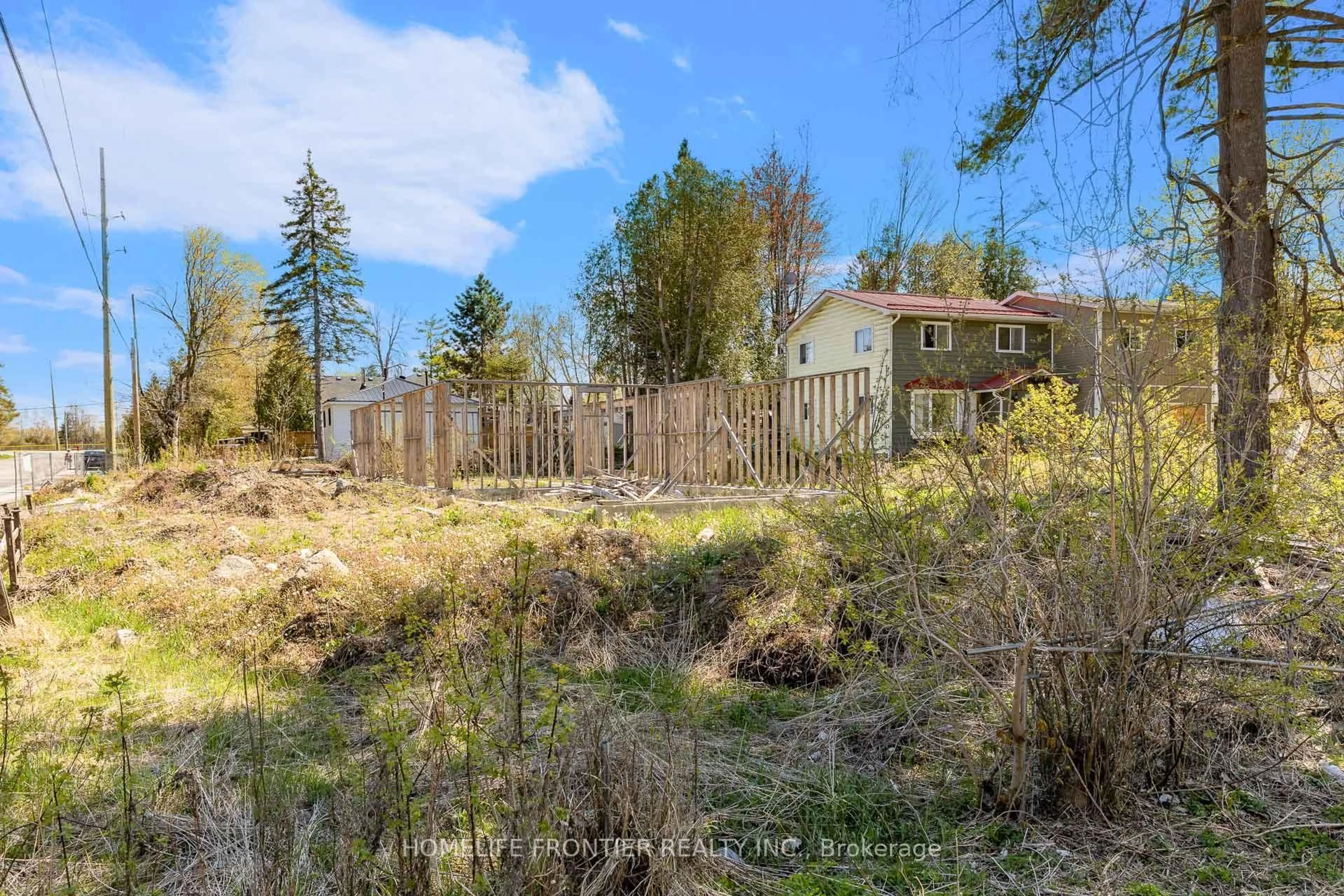 A pic from outside/outdoor area/front of a property/back of a property/a pic from drone, forest/trees view for 1790 St Johns Rd, Innisfil Ontario L9S 1S9