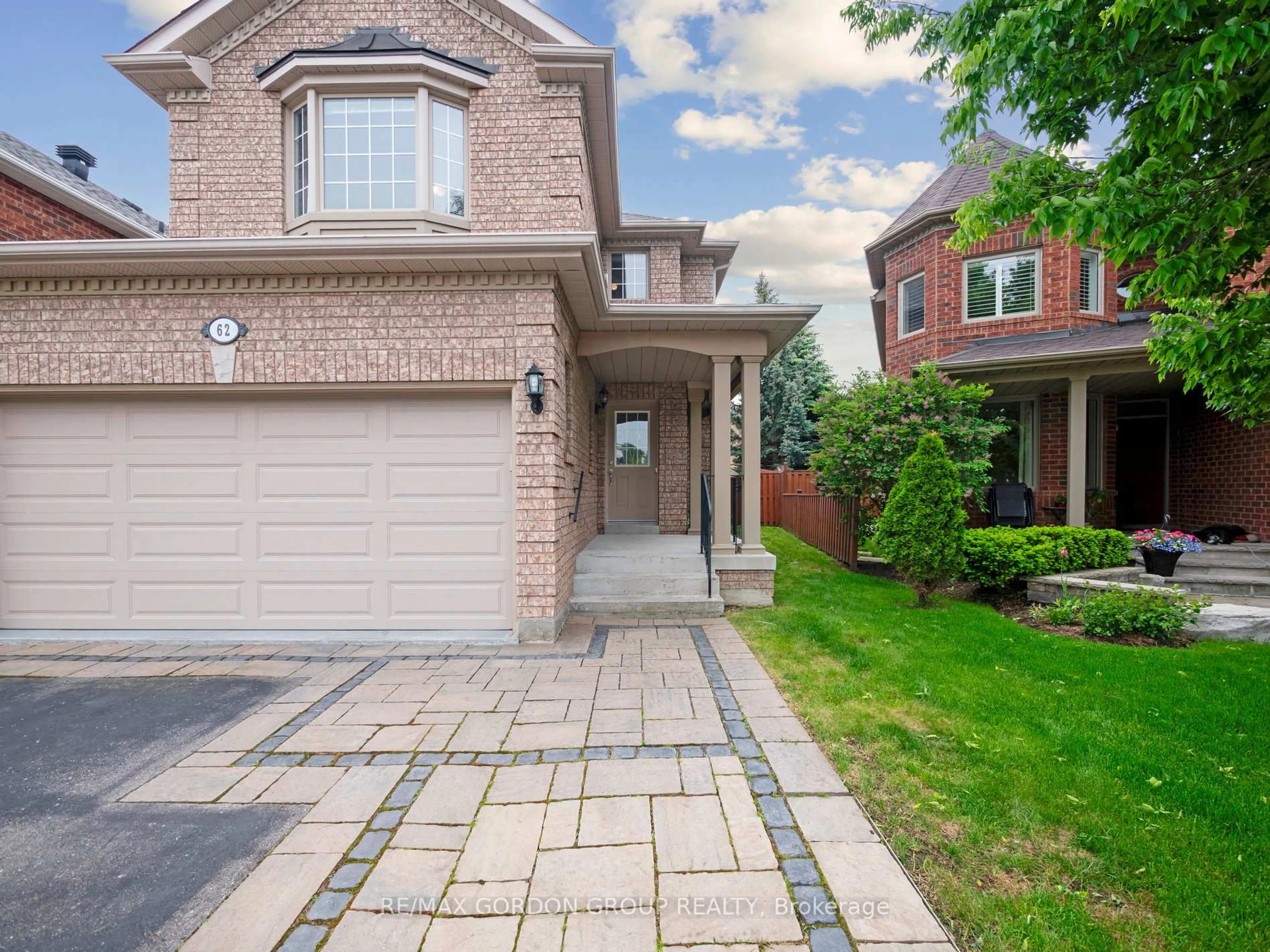 Home with brick exterior material, street for 62 Macedonia Crt, Newmarket Ontario L3X 2W8