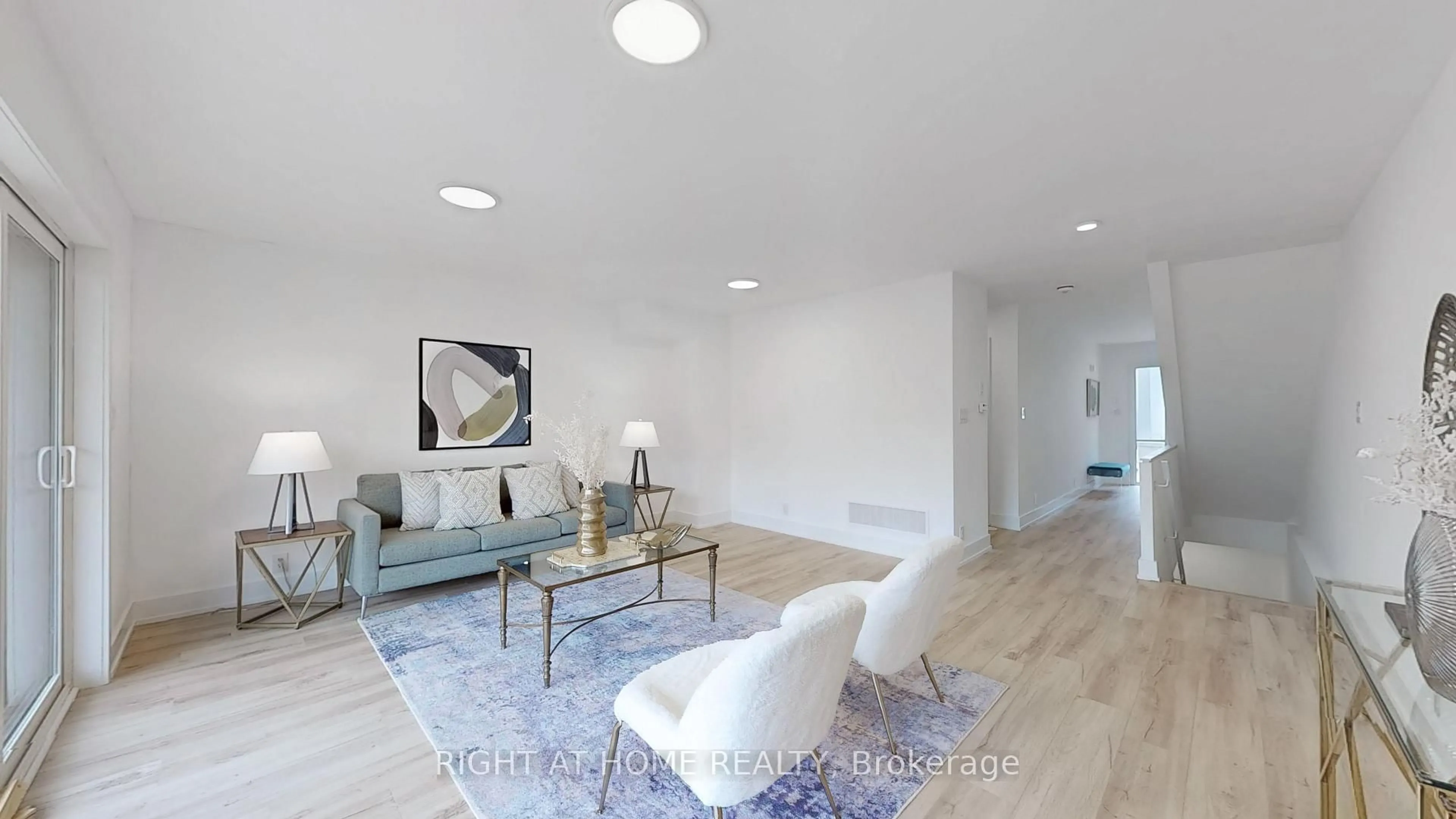 Living room with furniture, wood/laminate floor for 21 Chestnut Crt, Aurora Ontario L4G 4A4