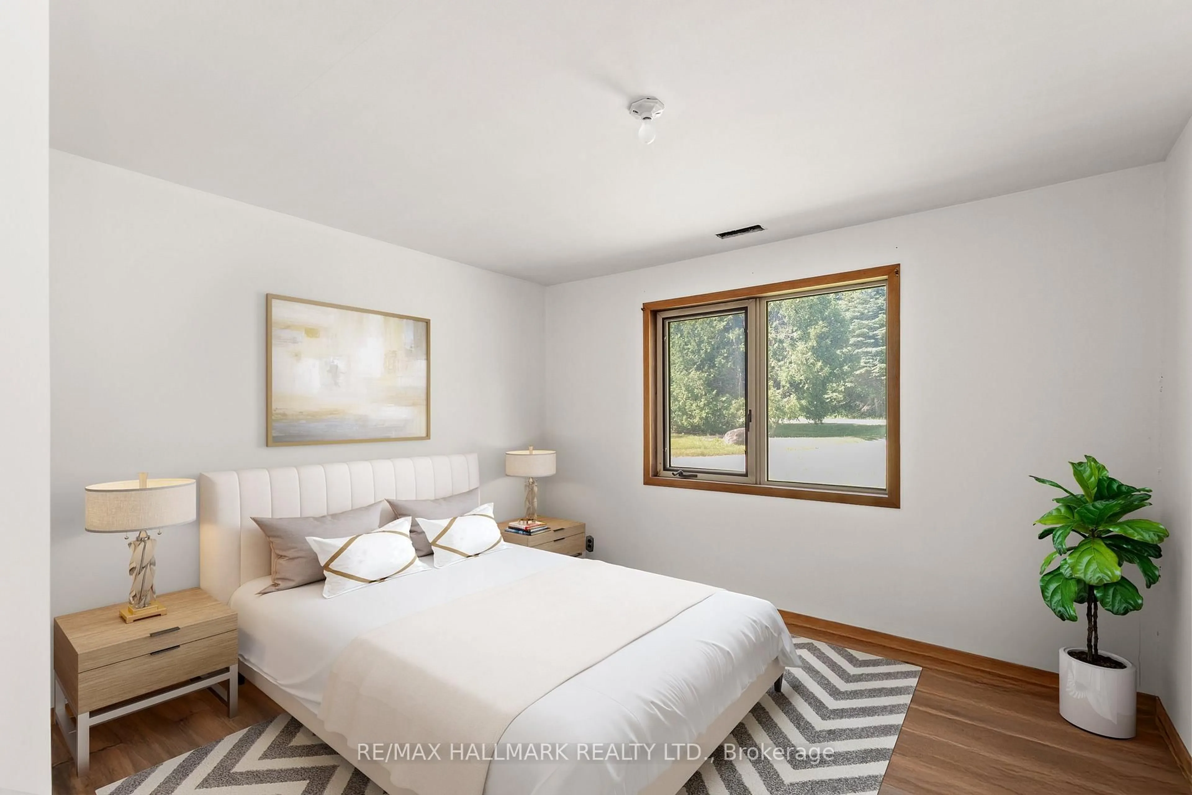 Bedroom with bed, wood/laminate floor for 24093 Weirs Sdrd, Georgina Ontario L0E 1N0