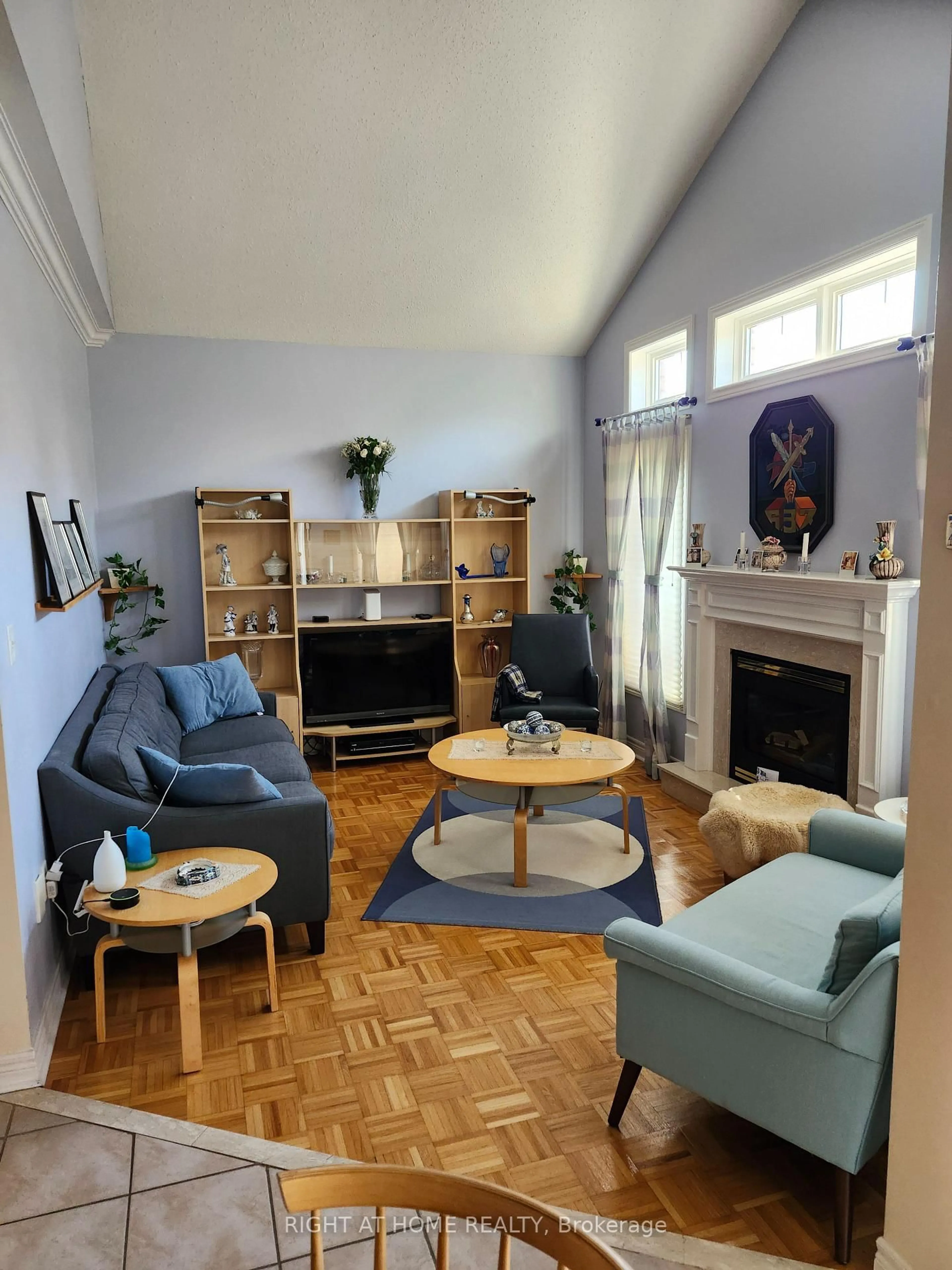 Living room with furniture, wood/laminate floor for 54 Golden Oak Ave, Richmond Hill Ontario L4S 1Y5