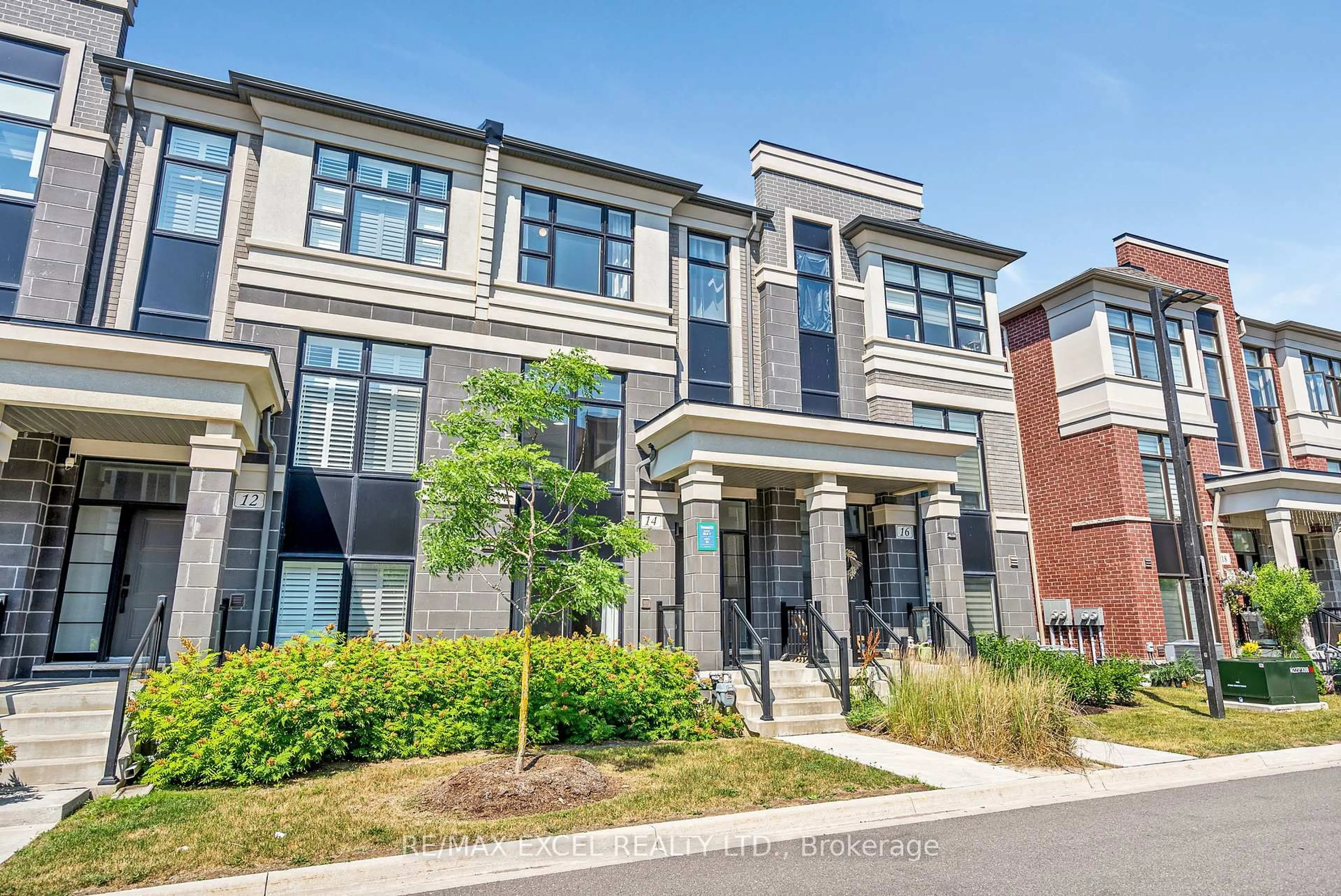 Home with brick exterior material, street for 14 Andalusia Lane, Markham Ontario L6E 0V3