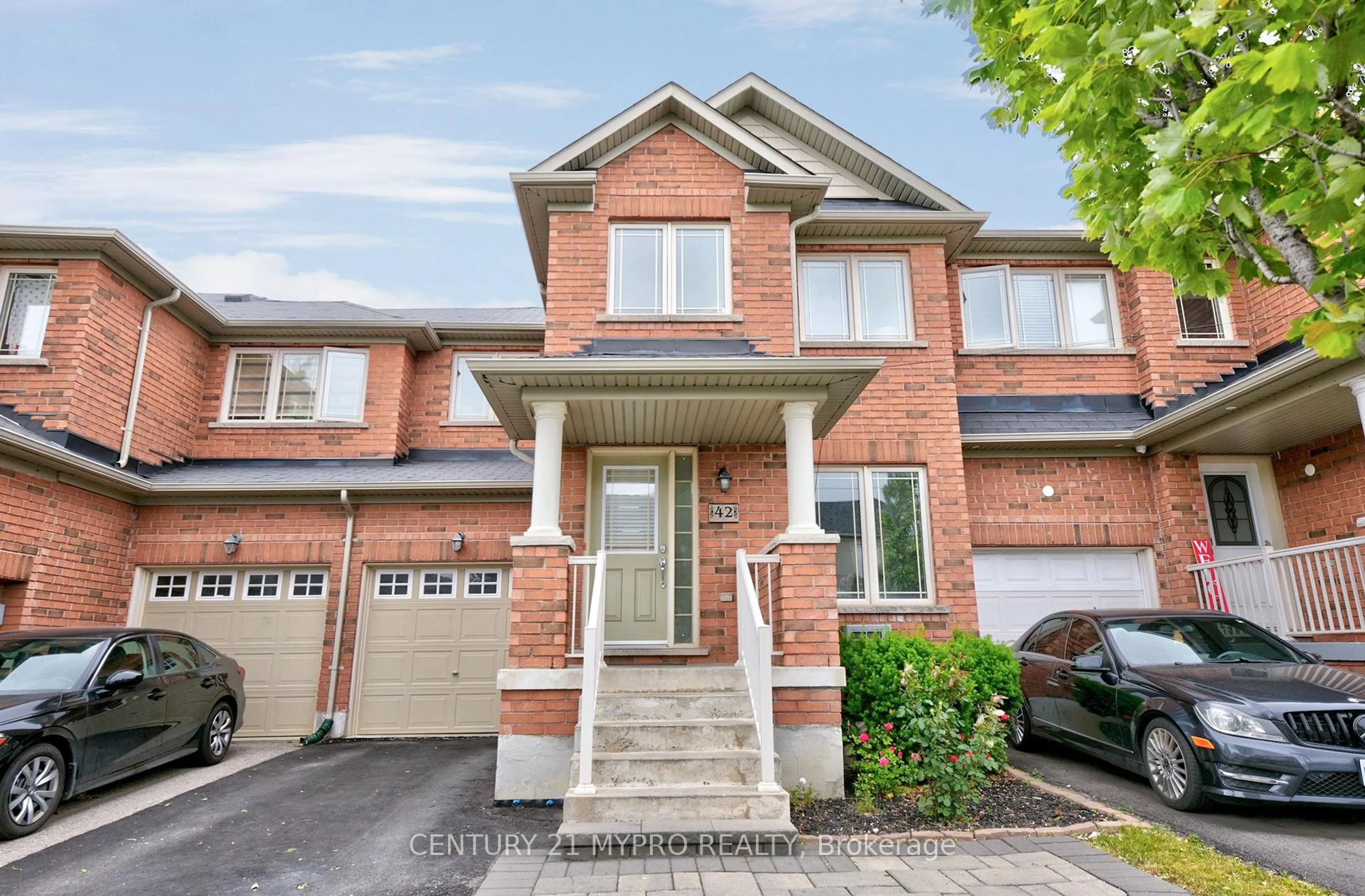 Home with brick exterior material, street for 42 Sequin Dr, Richmond Hill Ontario L4E 0J2