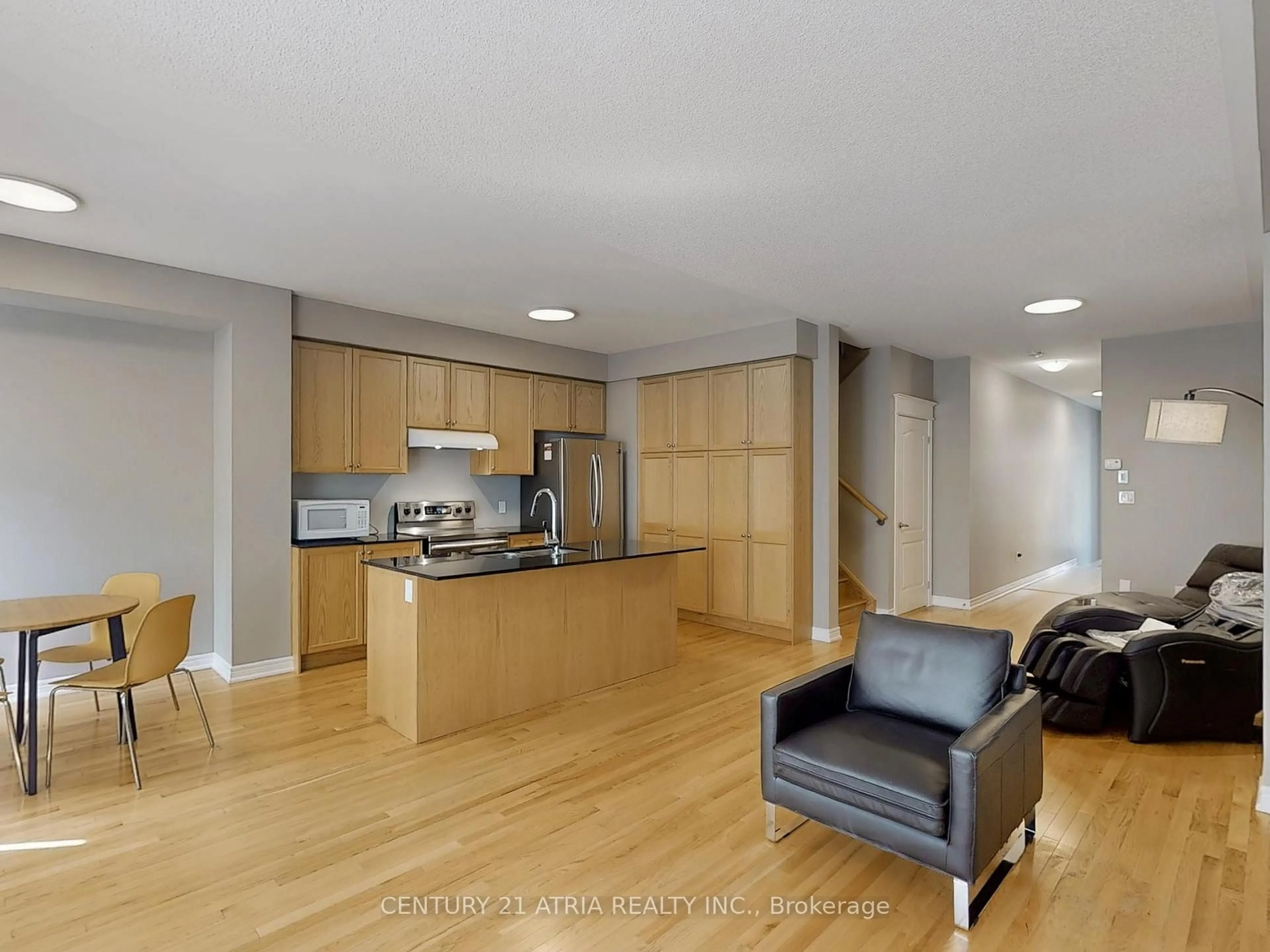 Open concept kitchen, wood/laminate floor for 8 Moonseed Lane, Richmond Hill Ontario L4E 1E7