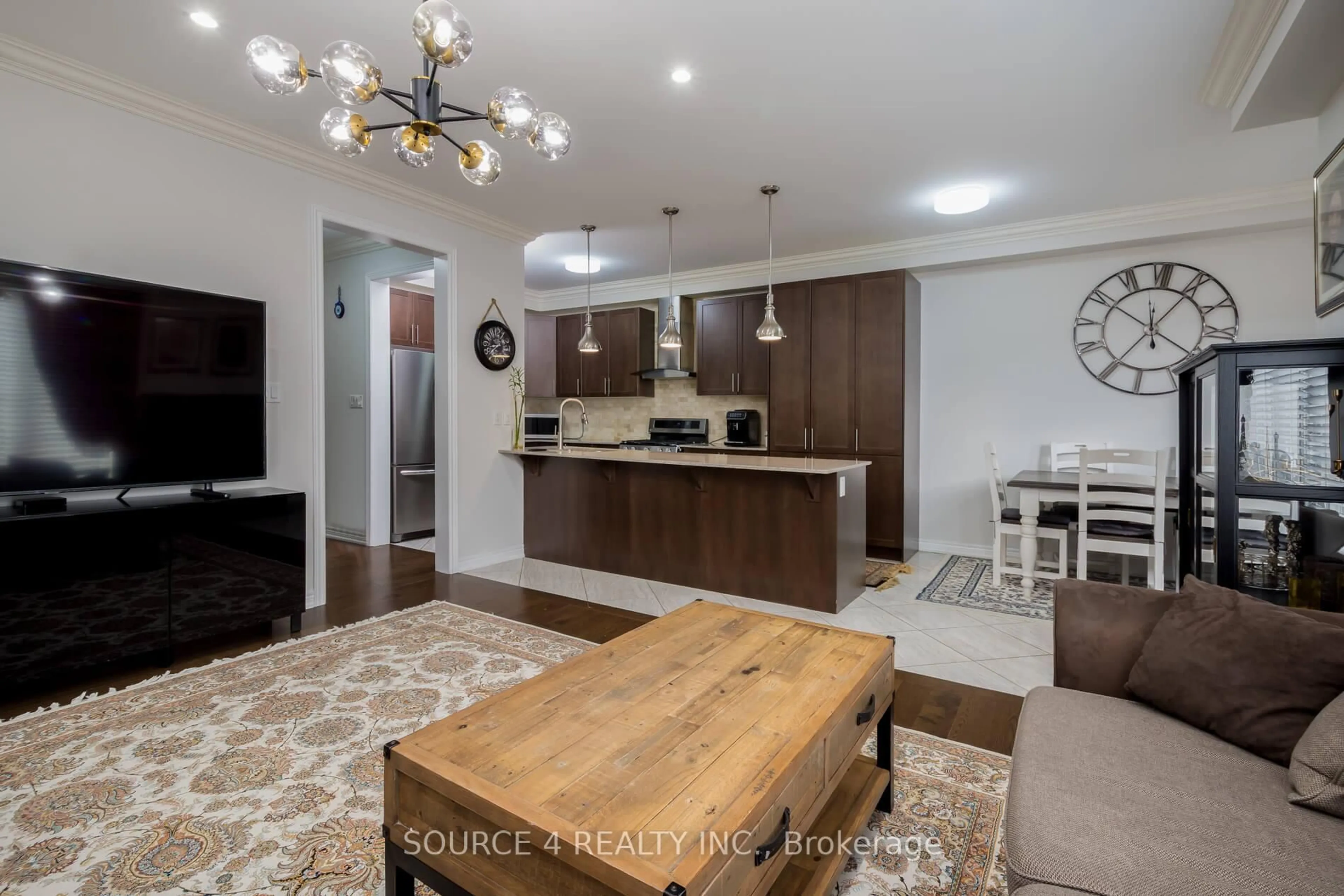 Open concept kitchen, wood/laminate floor for 129 Barons St, Vaughan Ontario L4H 1Y7