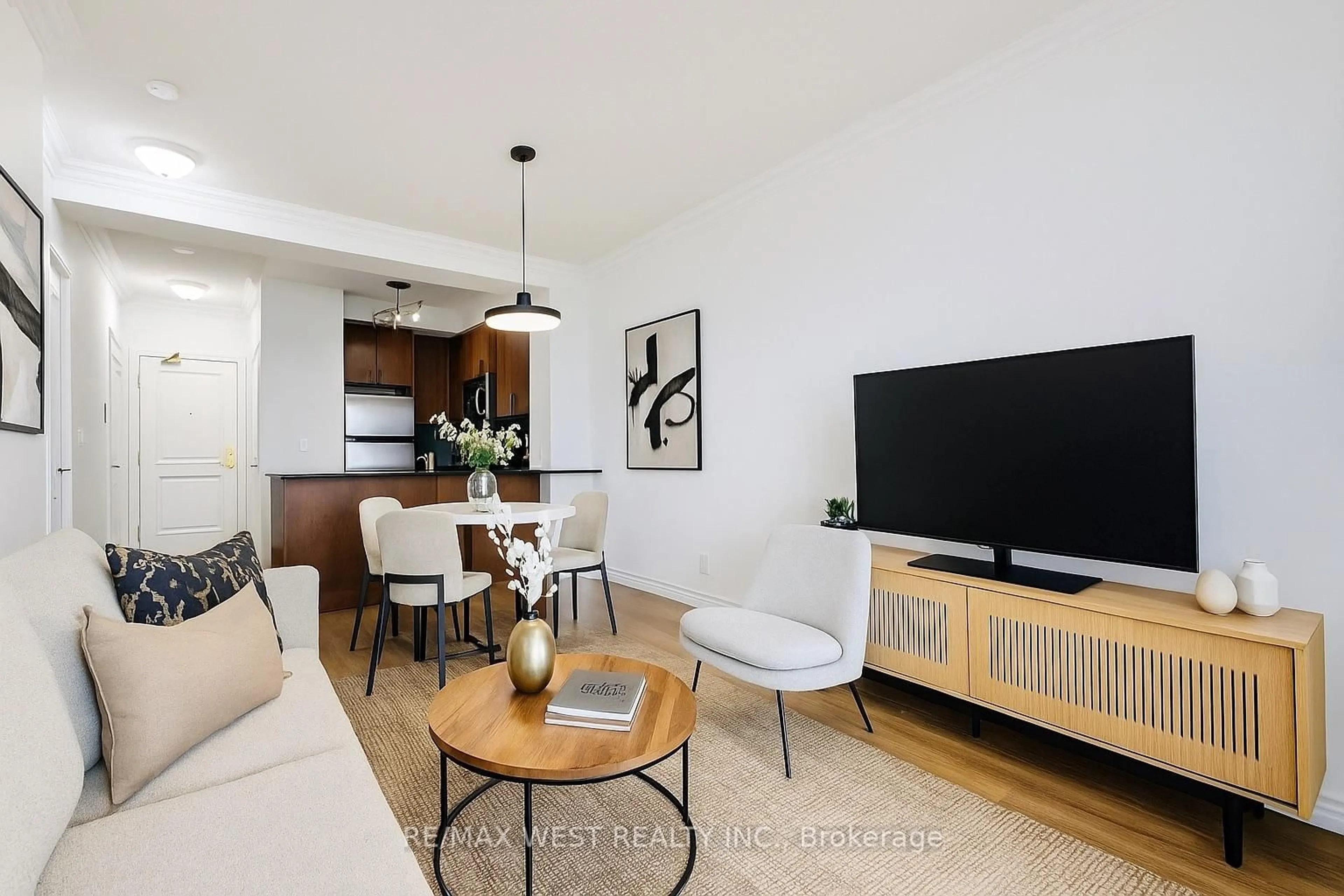 Living room with furniture, wood/laminate floor for 9235 Jane St #1404, Vaughan Ontario L6A 0J8