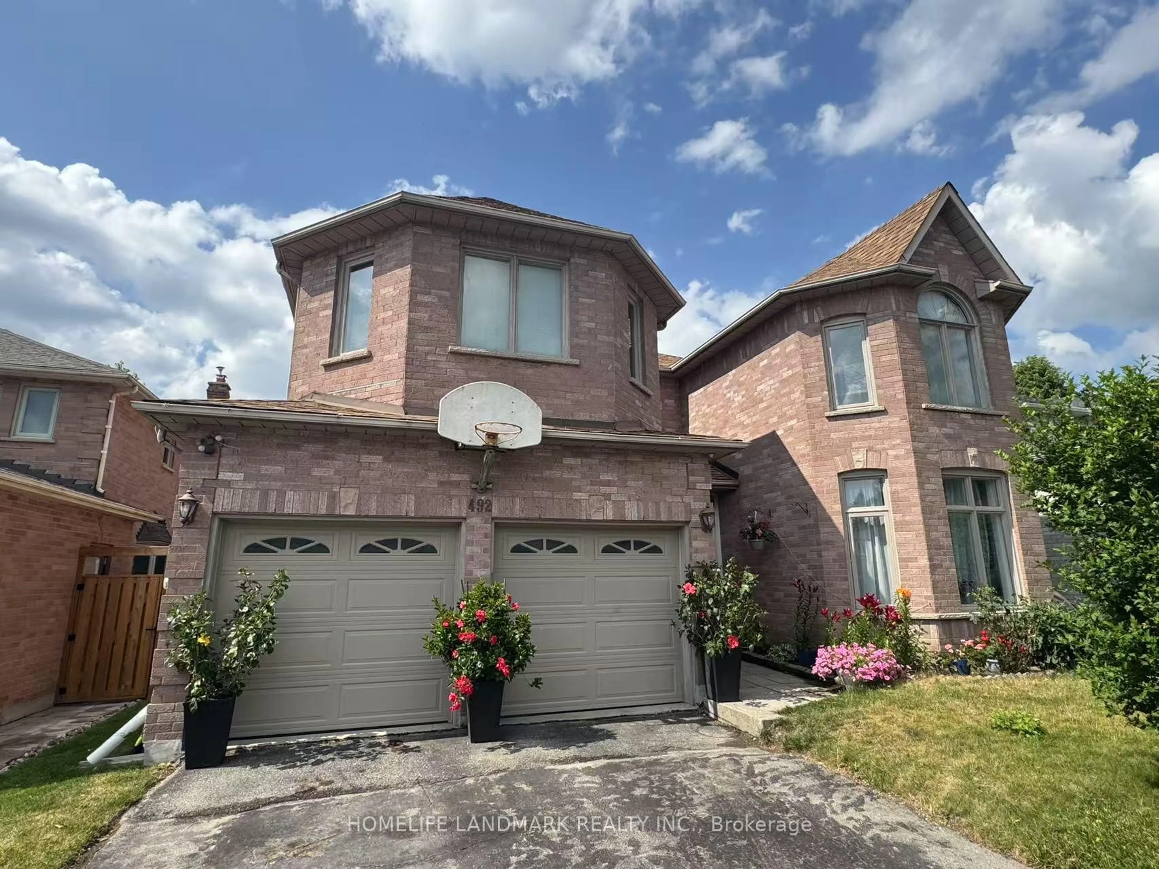 Home with brick exterior material, street for 492 Traviss Dr, Newmarket Ontario L3Y 7K5