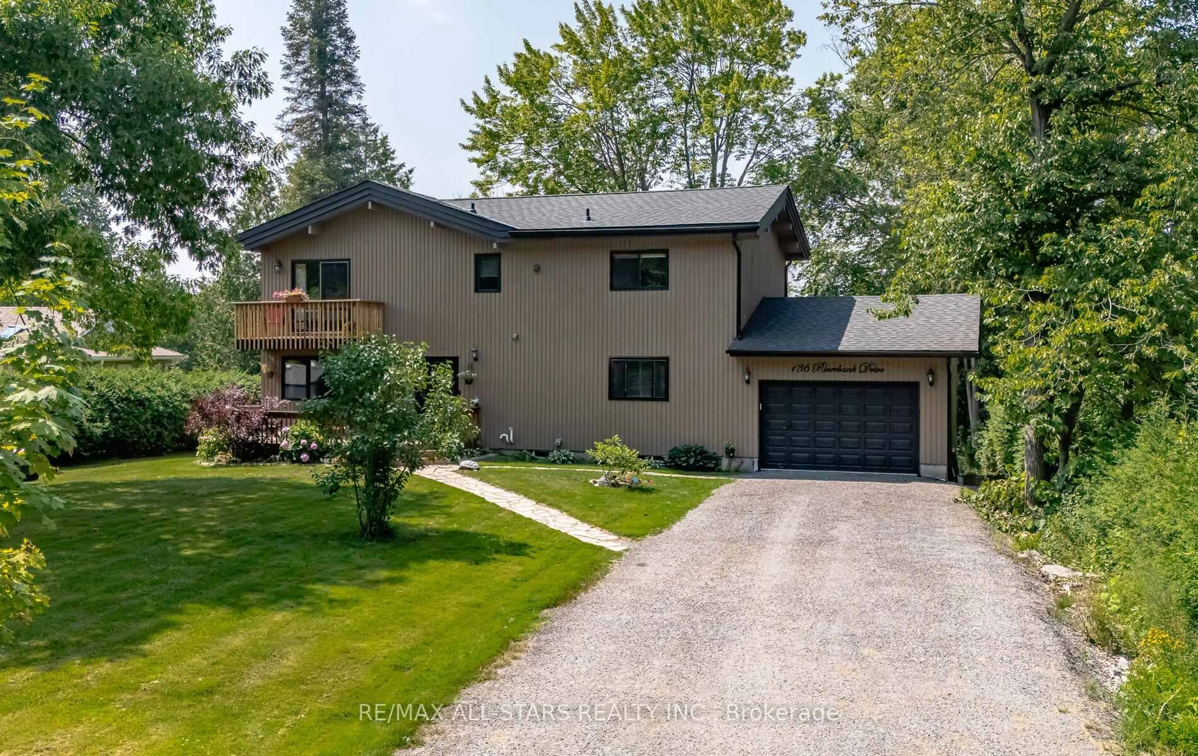 Home with brick exterior material, street for 136 Riverbank Dr, Georgina Ontario L0E 1N0