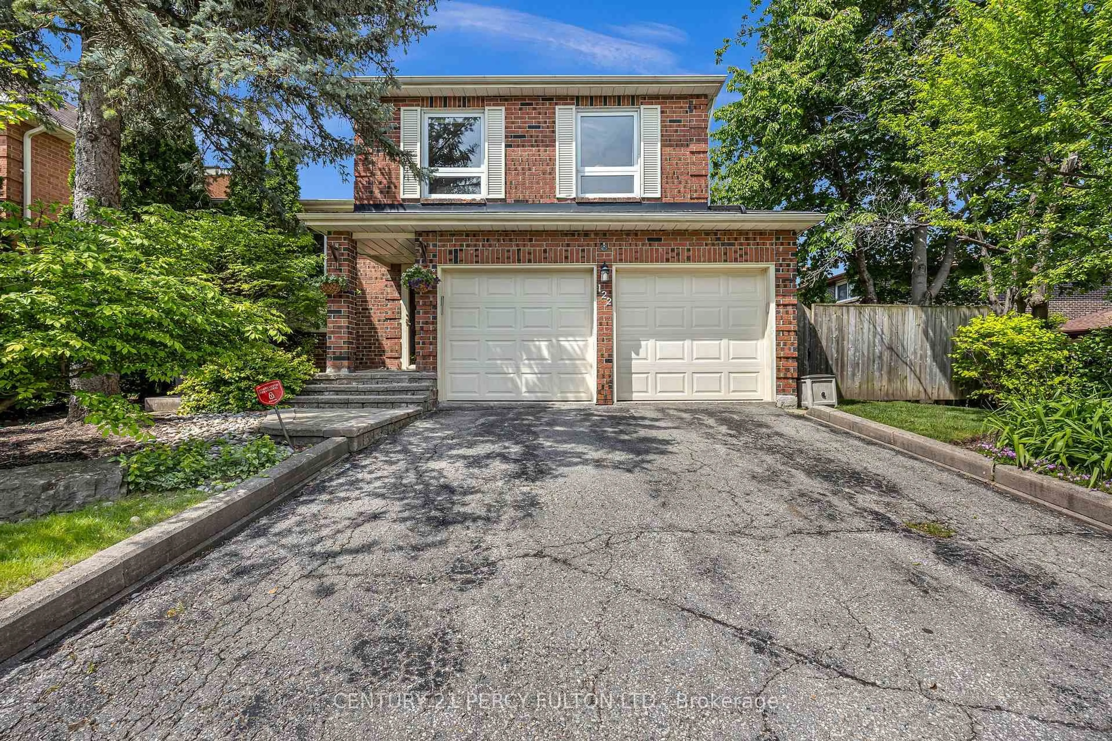 Home with brick exterior material, street for 122 Wootten Way, Markham Ontario L3P 4C6