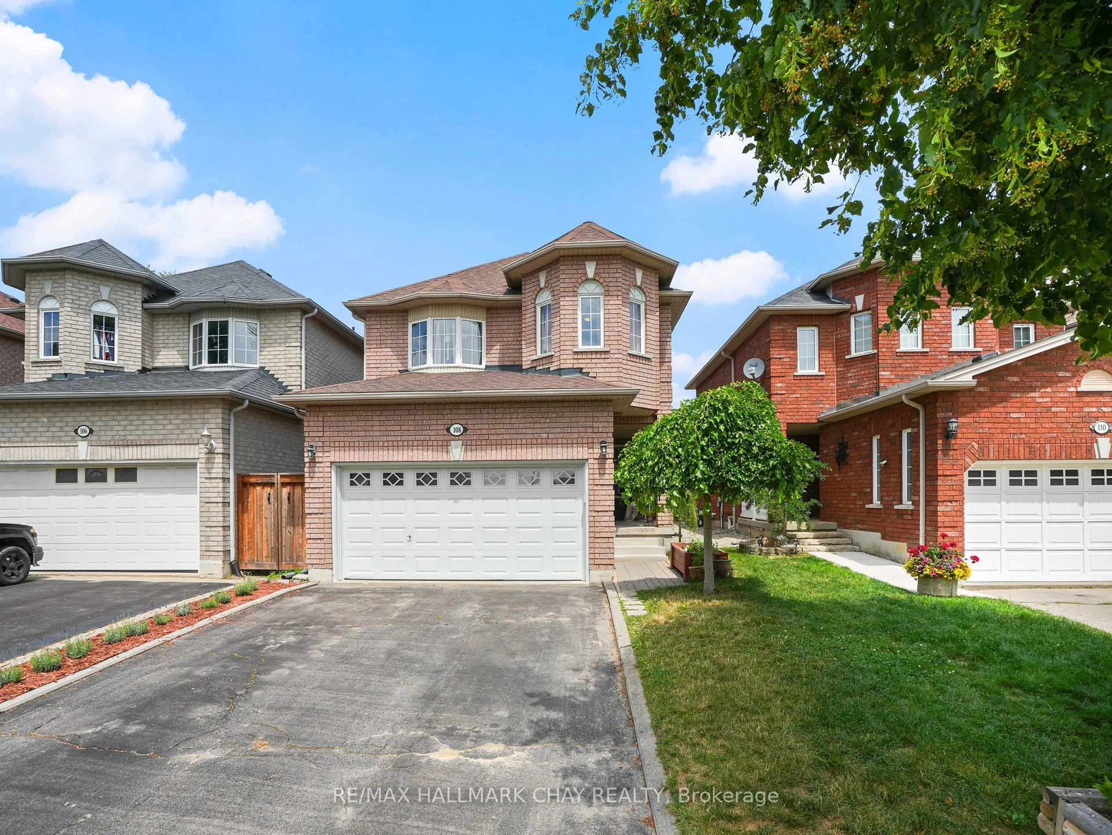Home with brick exterior material, street for 108 Henderson Cres, New Tecumseth Ontario L9R 1Y5