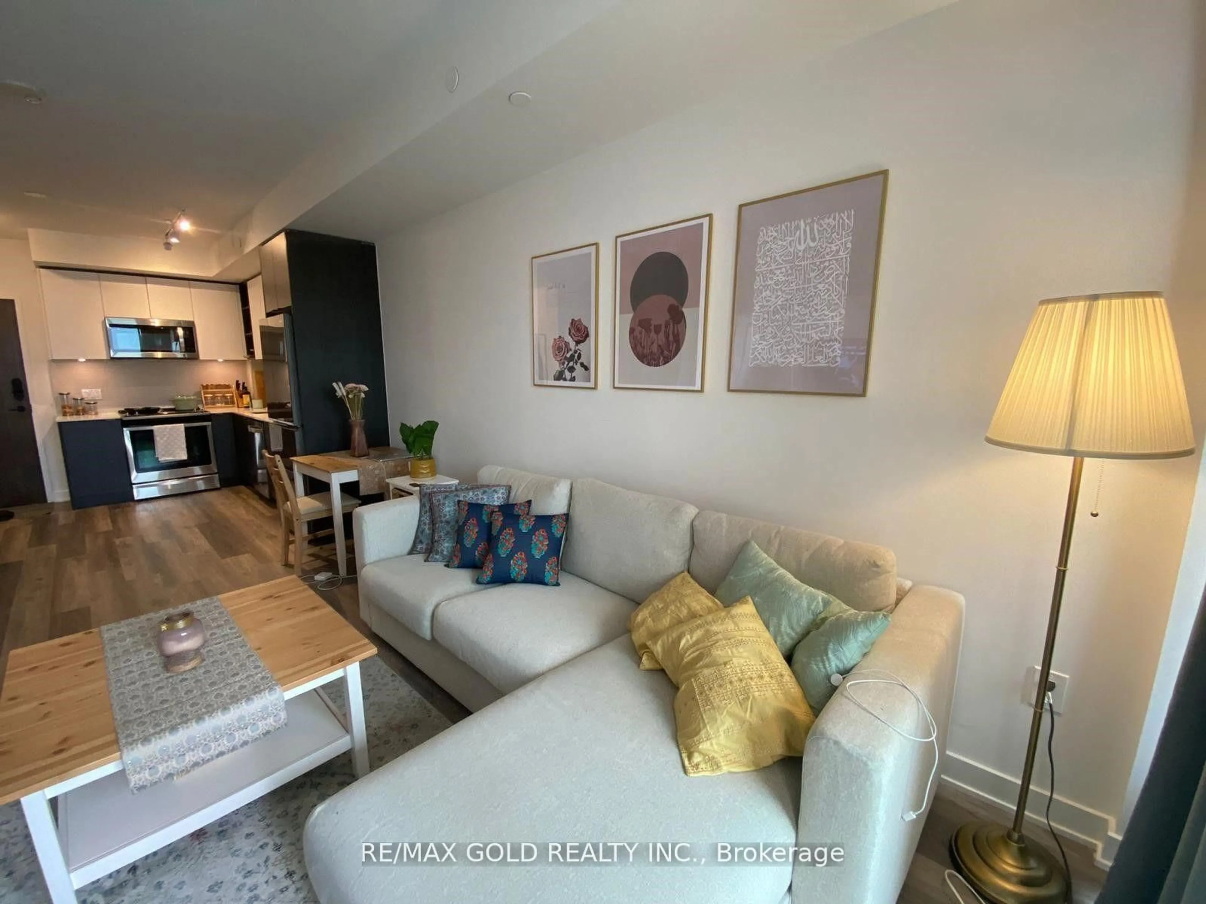 Living room with furniture, wood/laminate floor for 100 Eagle Rock Way #801, Vaughan Ontario L6A 5B9