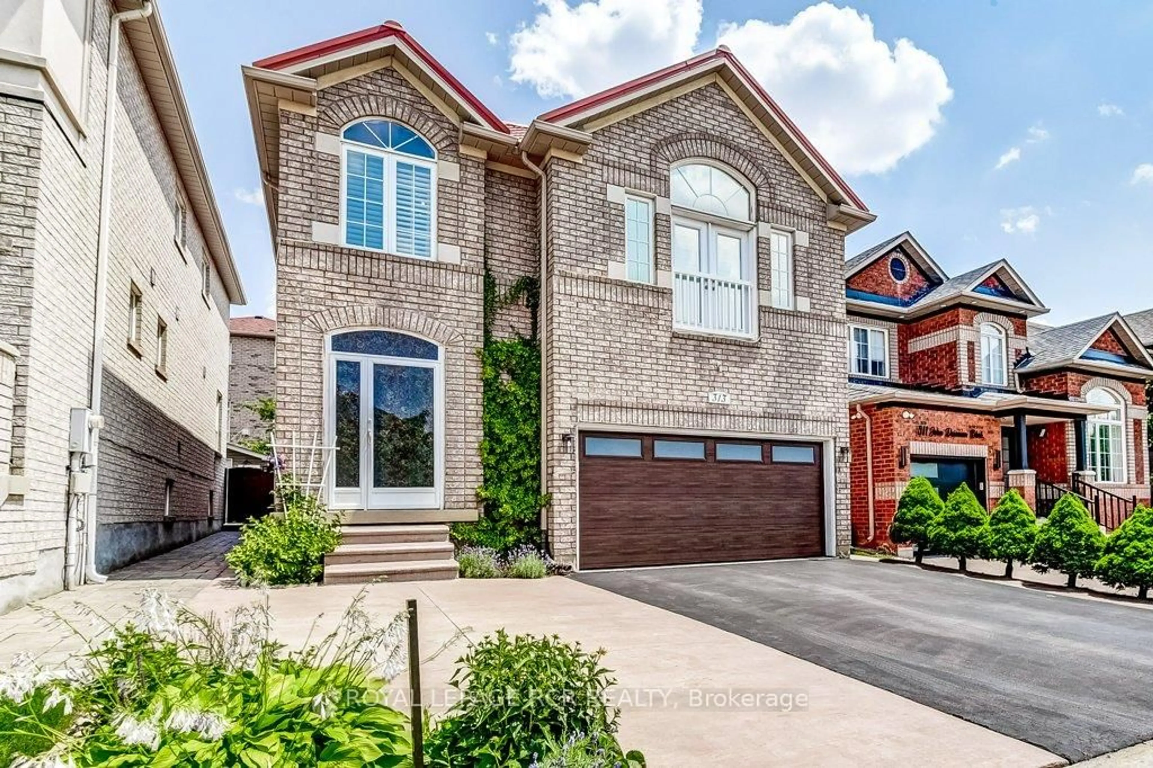 Home with brick exterior material, street for 313 John Deisman Blvd, Vaughan Ontario L6A 3H2