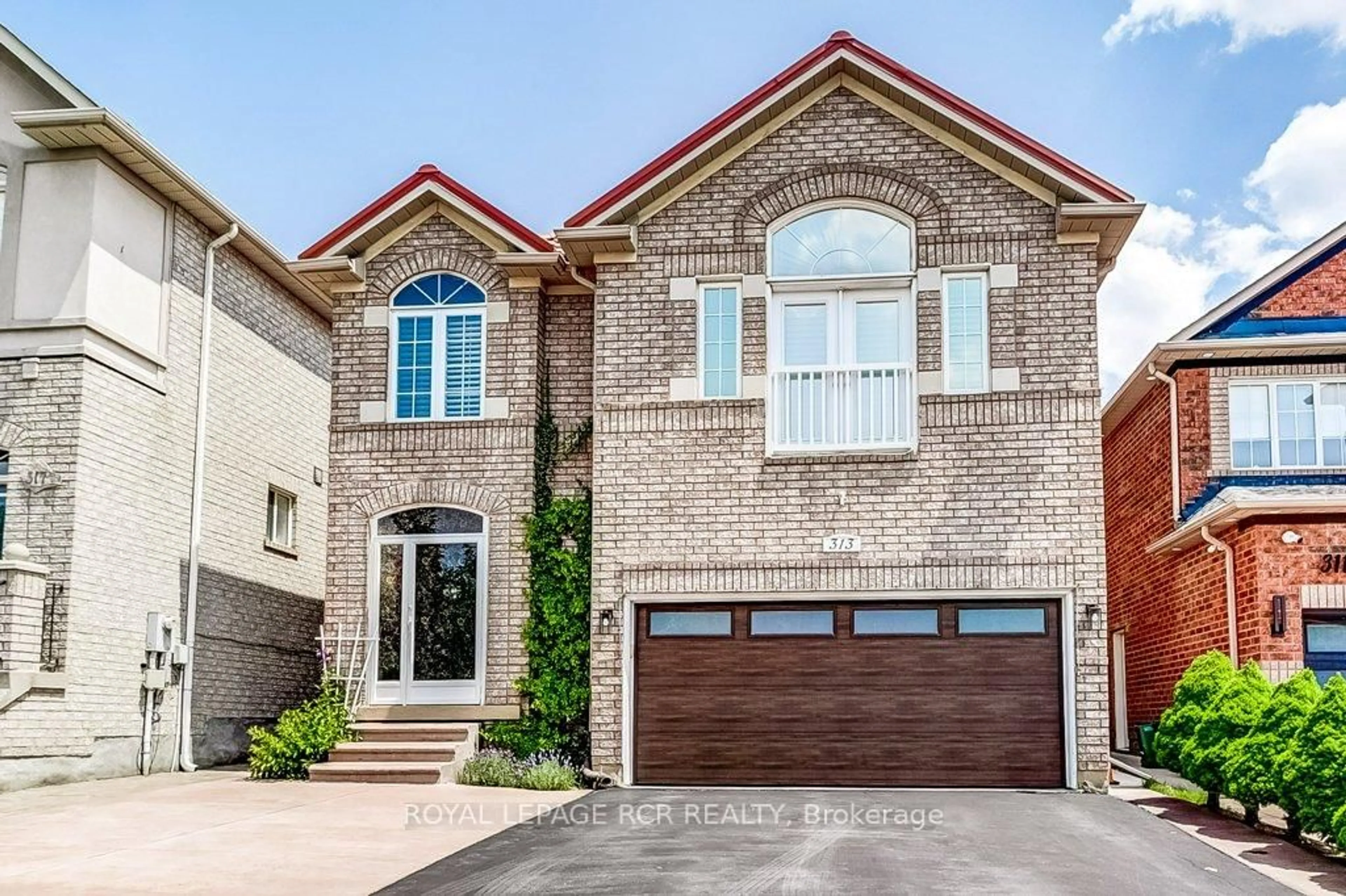 Home with brick exterior material, street for 313 John Deisman Blvd, Vaughan Ontario L6A 3H2