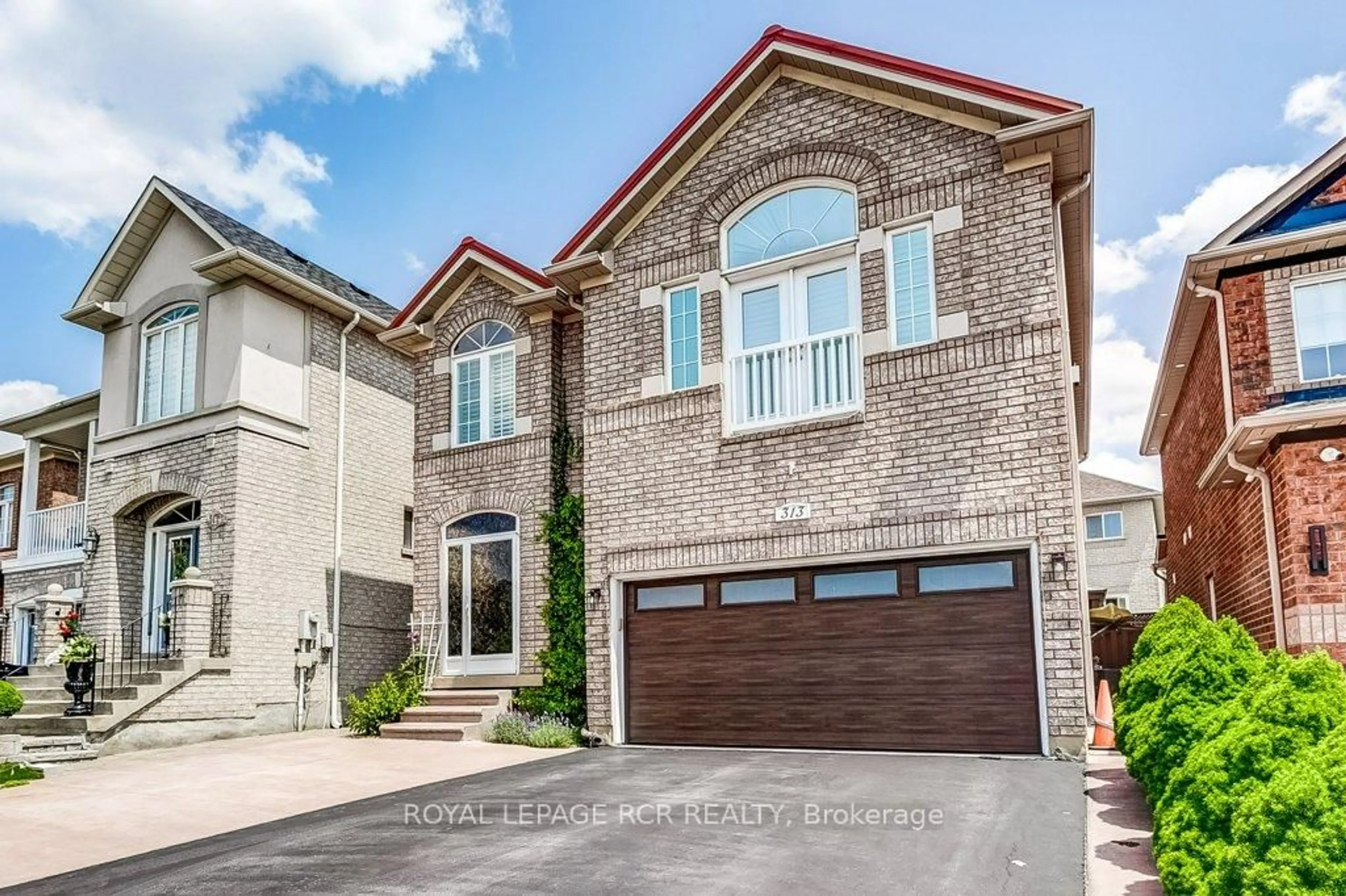 Home with brick exterior material, street for 313 John Deisman Blvd, Vaughan Ontario L6A 3H2