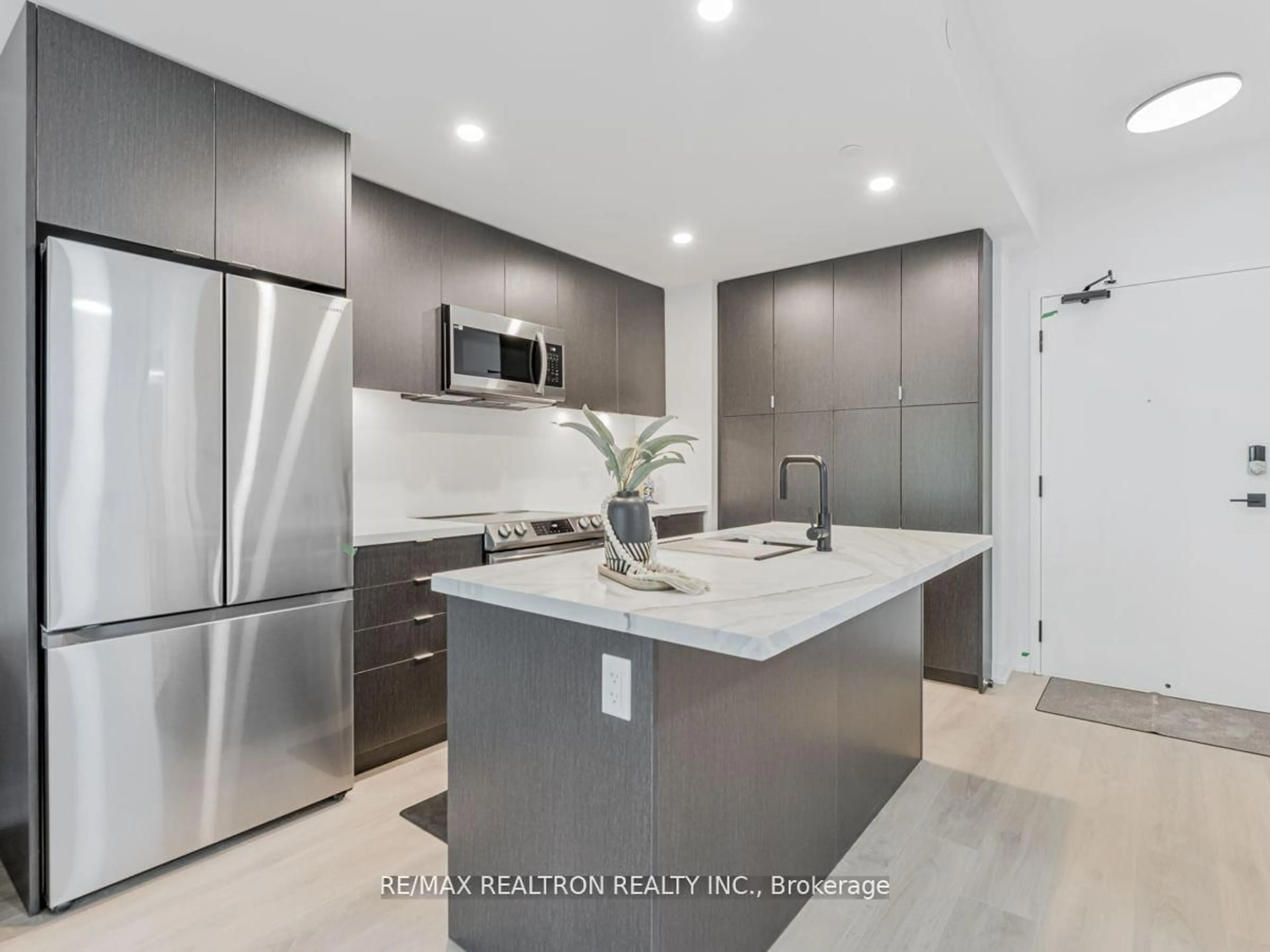 Contemporary kitchen, ceramic/tile floor for 415 Sea Ray Ave #229, Innisfil Ontario L9S 0N9