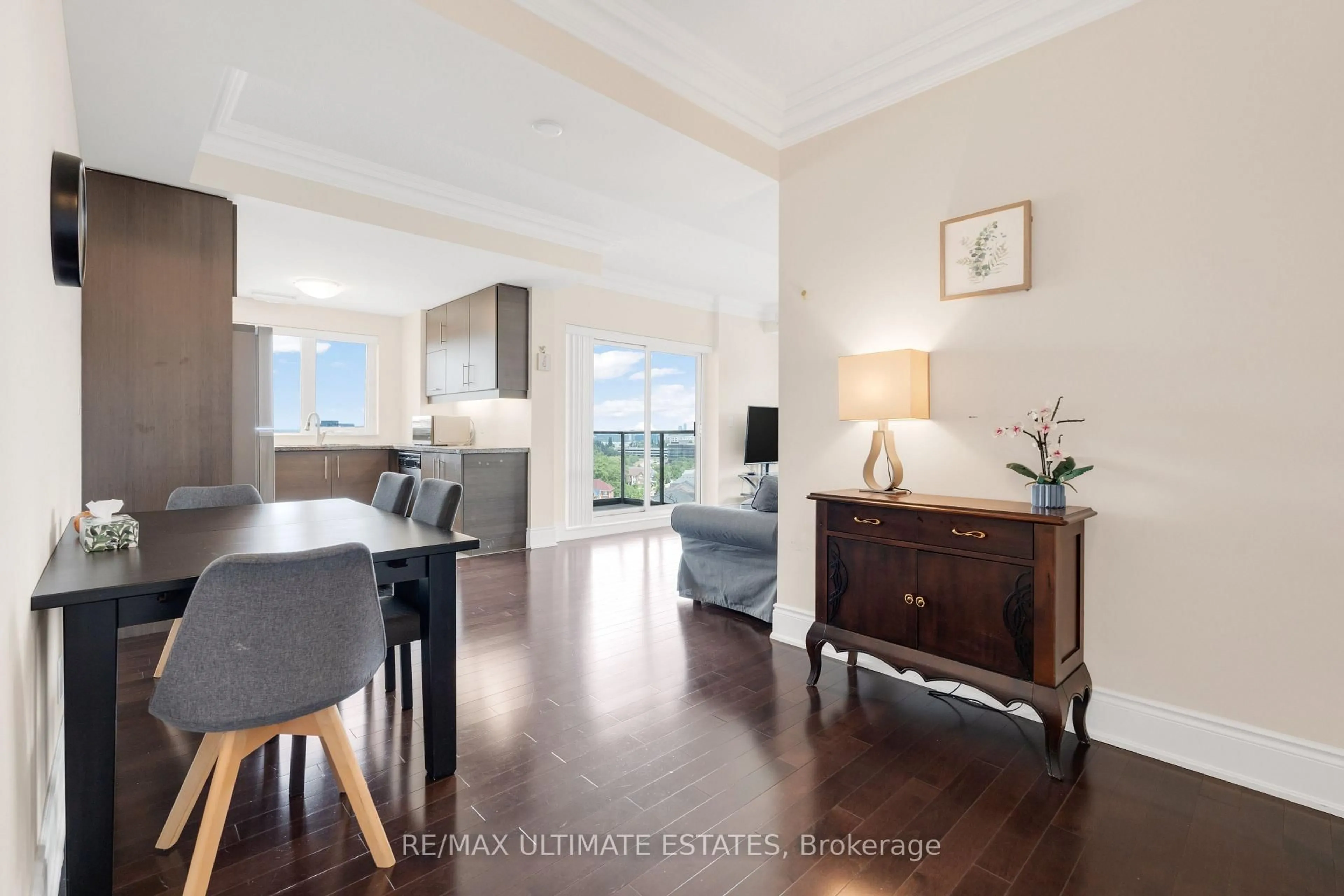 Living room with furniture, wood/laminate floor for 233 South Park Rd #1211, Markham Ontario L3T 0B3