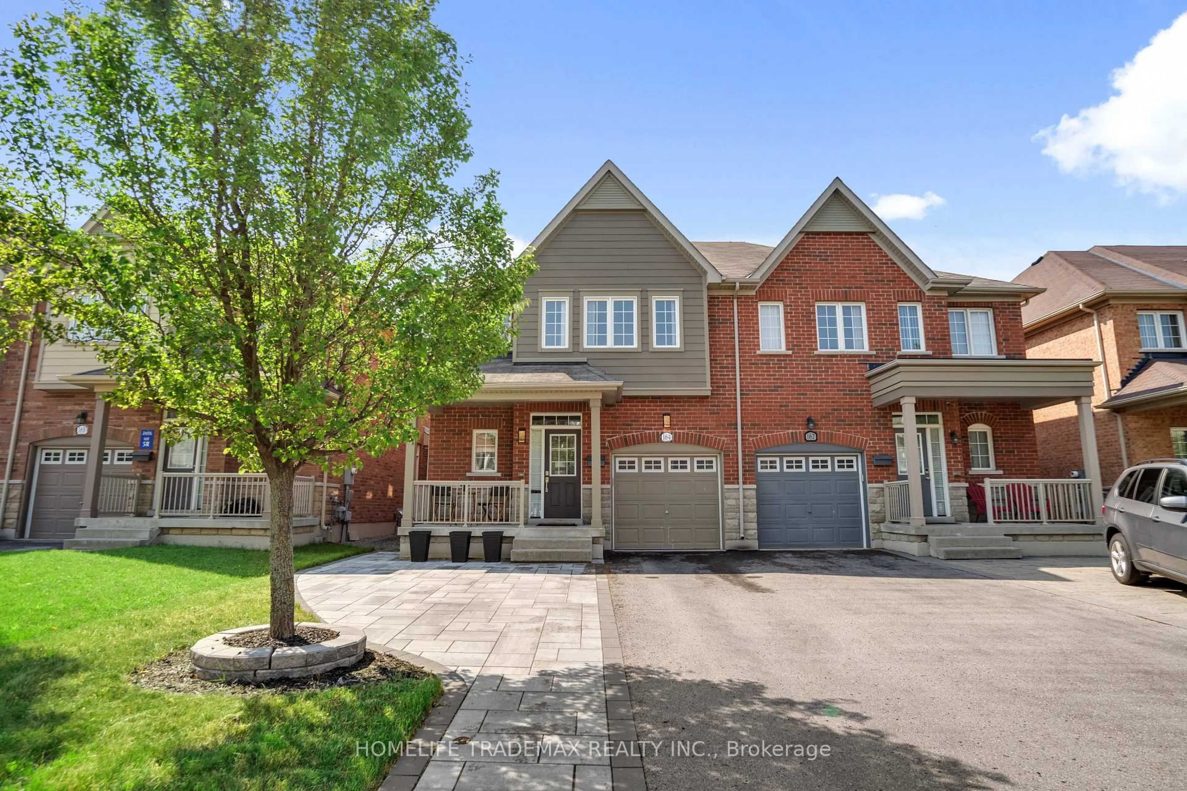 Home with brick exterior material, street for 164 Lewis Honey Dr, Aurora Ontario L4G 0R8