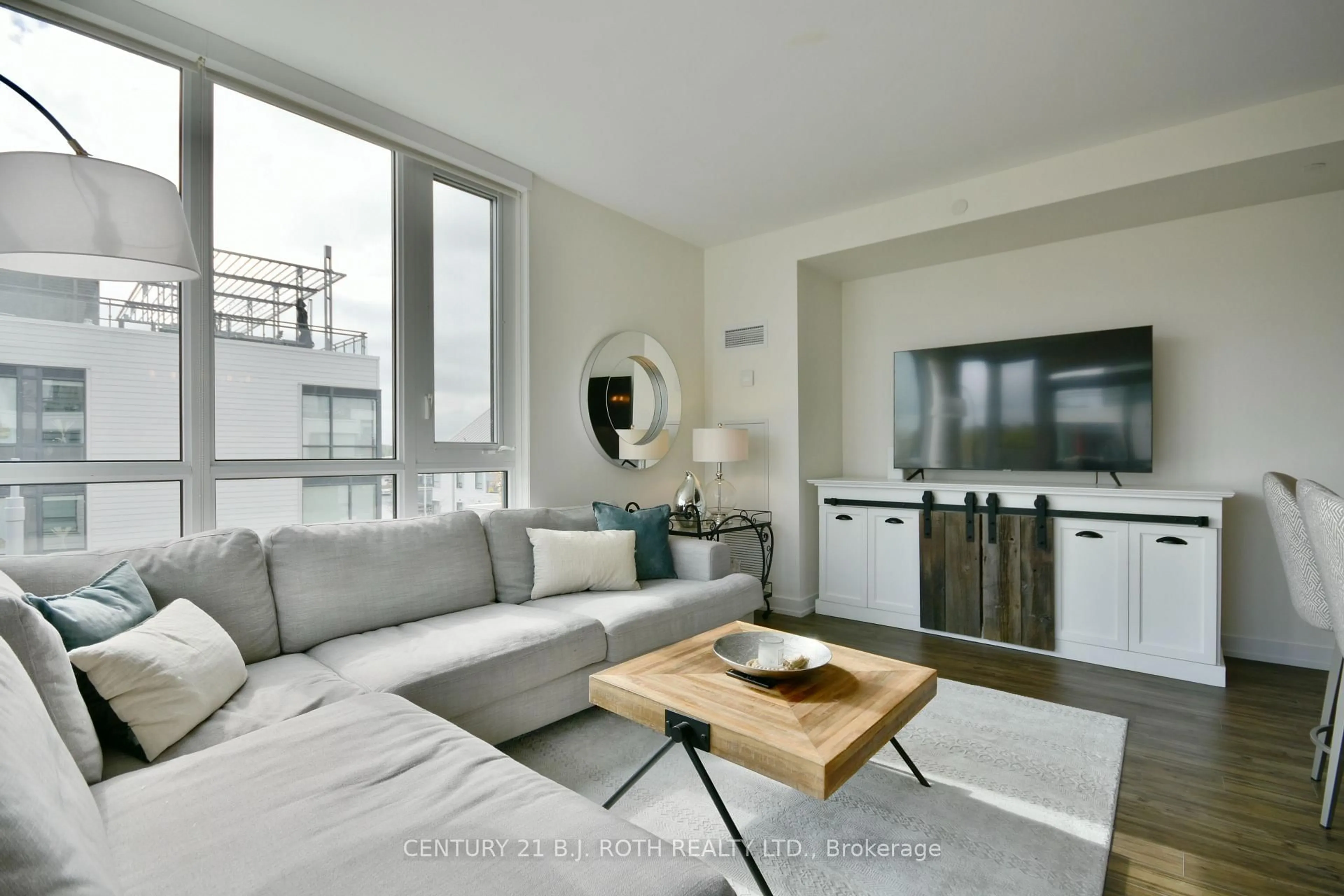 Living room with furniture, unknown for 271 Sea Ray Ave #B317, Innisfil Ontario L9S 0J8