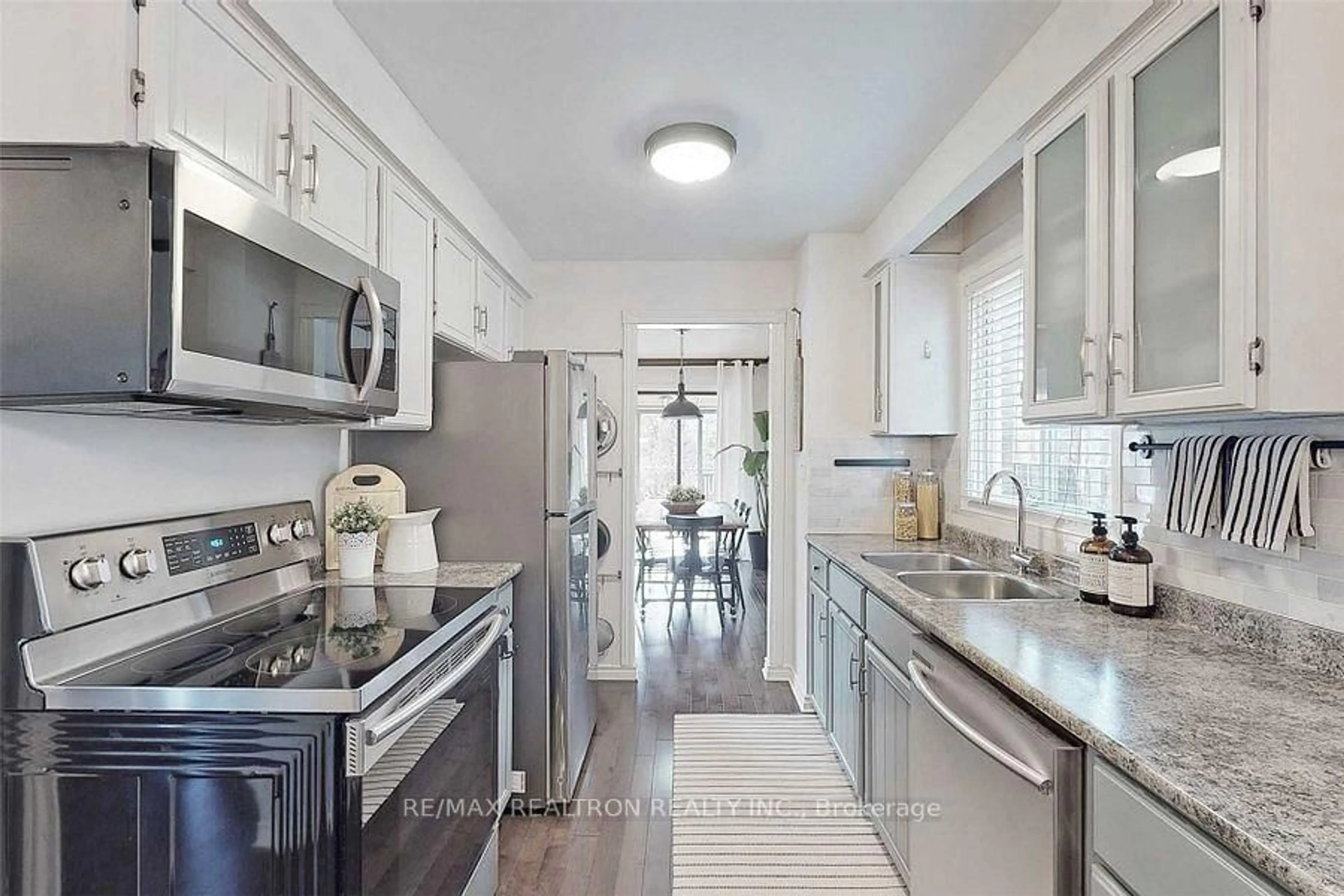 Open concept kitchen, ceramic/tile floor for 74 Trothen Circ, Markham Ontario L3P 4H6