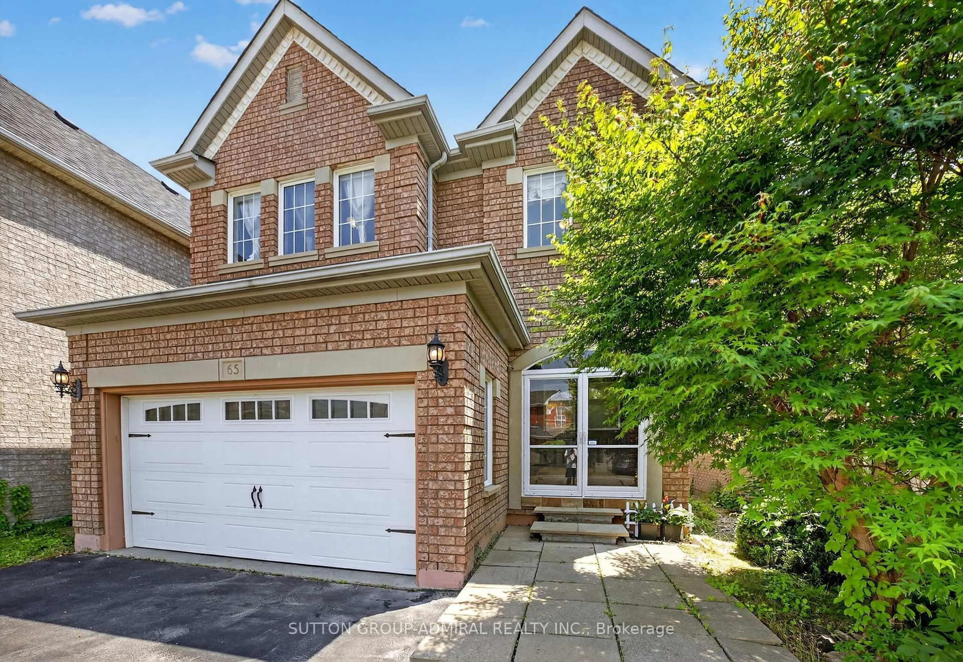 Home with brick exterior material, street for 65 Belvia Dr, Vaughan Ontario L4K 5J6