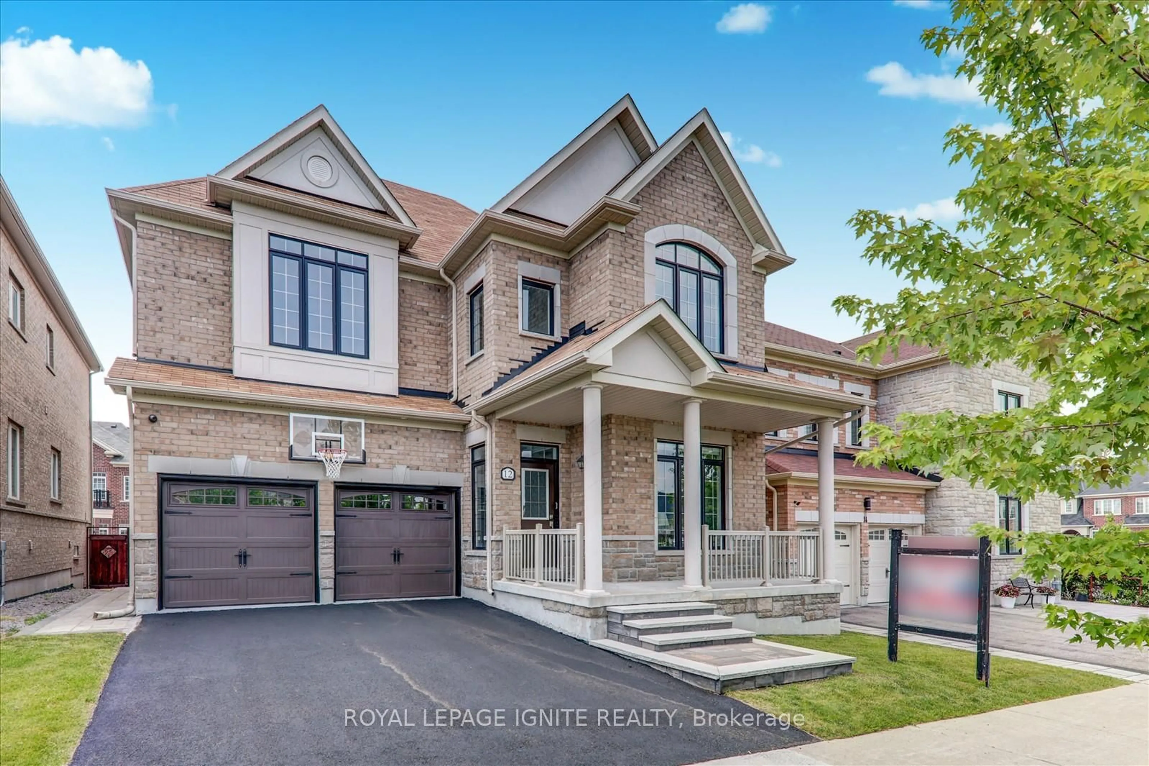 Home with brick exterior material, street for 12 Warton Crt, Markham Ontario L6E 2G1