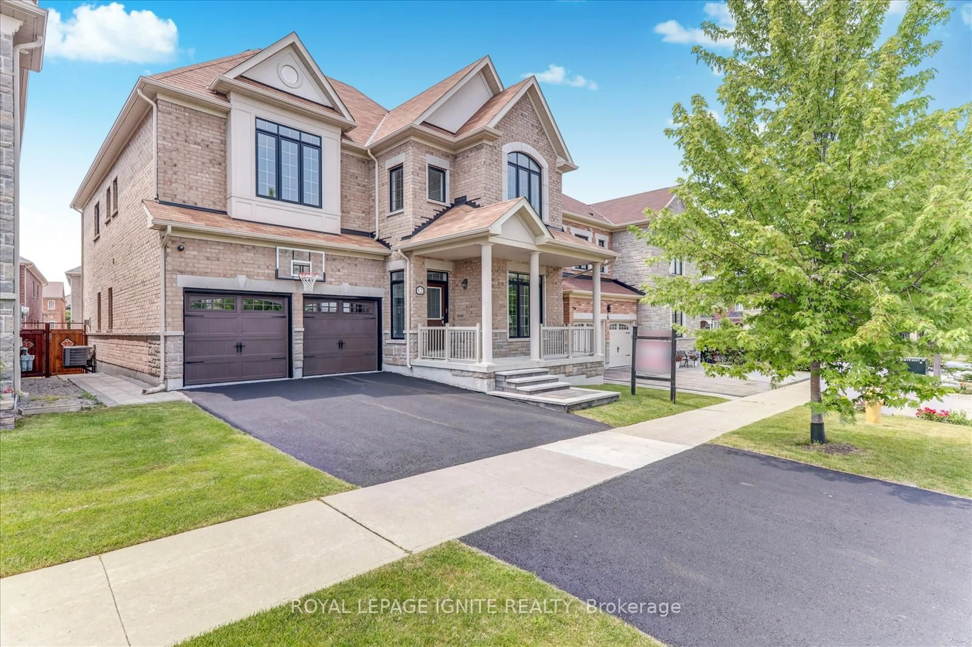 Home with brick exterior material, street for 12 Warton Crt, Markham Ontario L6E 2G1