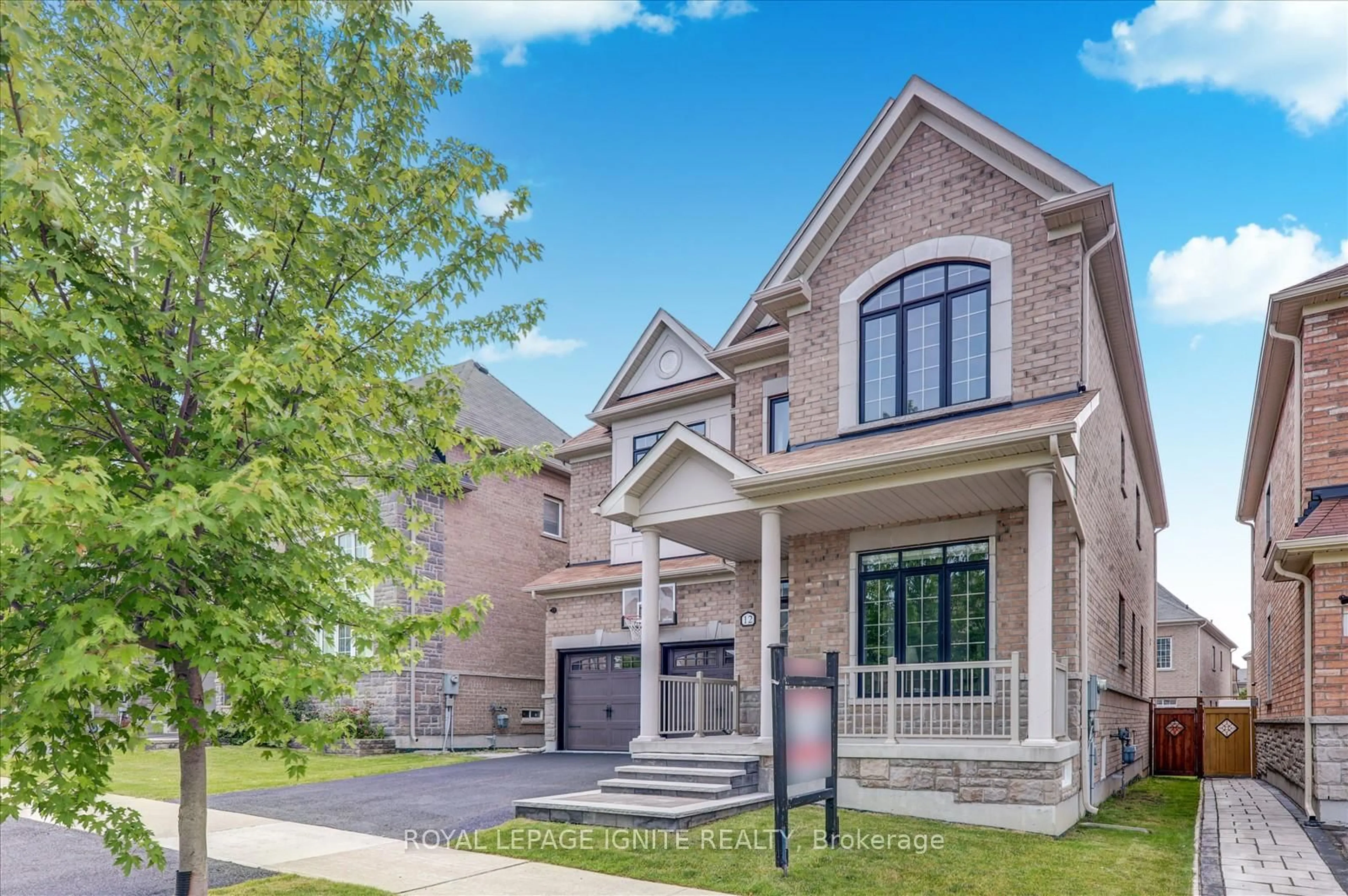 Home with brick exterior material, street for 12 Warton Crt, Markham Ontario L6E 2G1