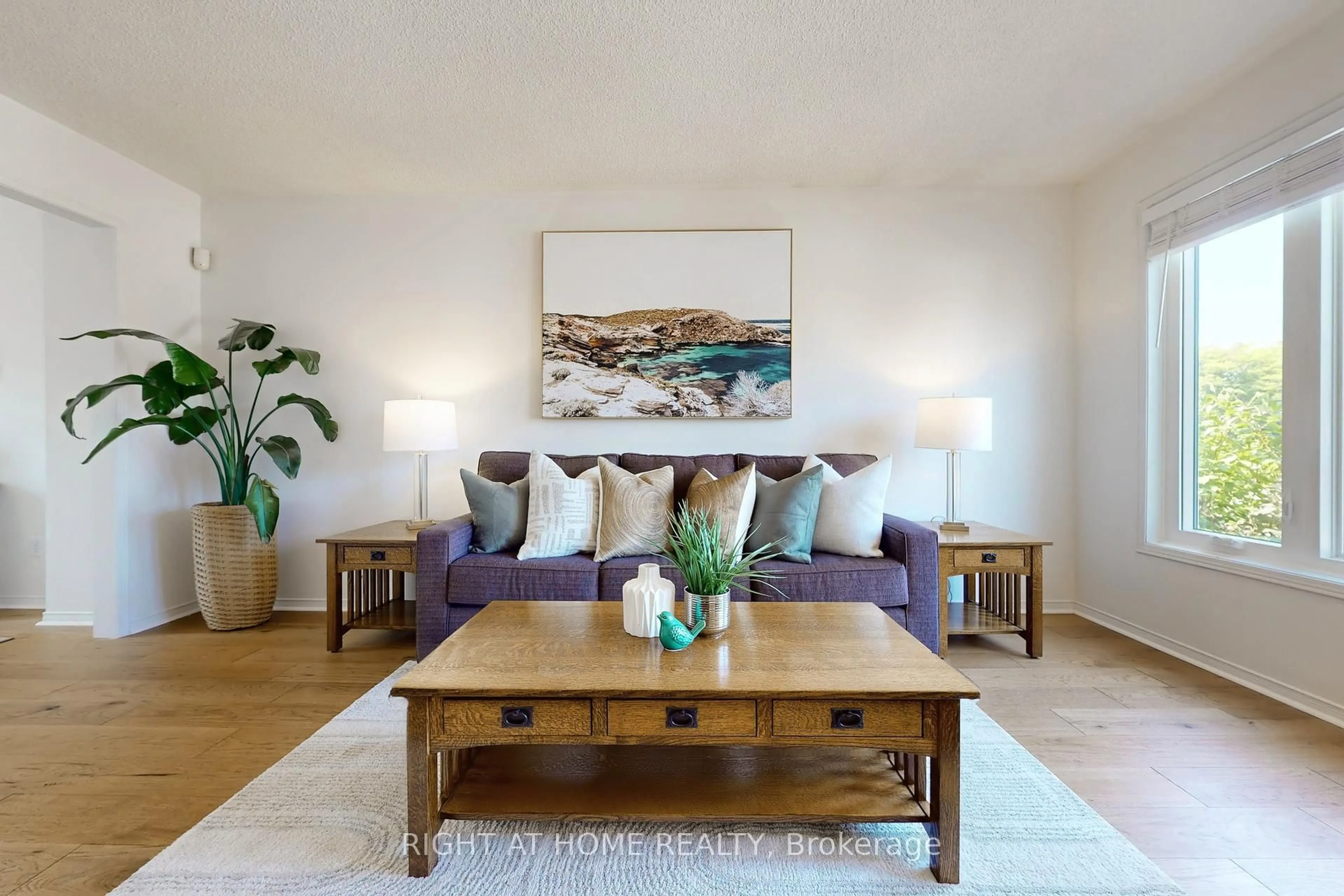 Living room with furniture, wood/laminate floor for 93 Compton Cres, Bradford West Gwillimbury Ontario L3Z 2X7