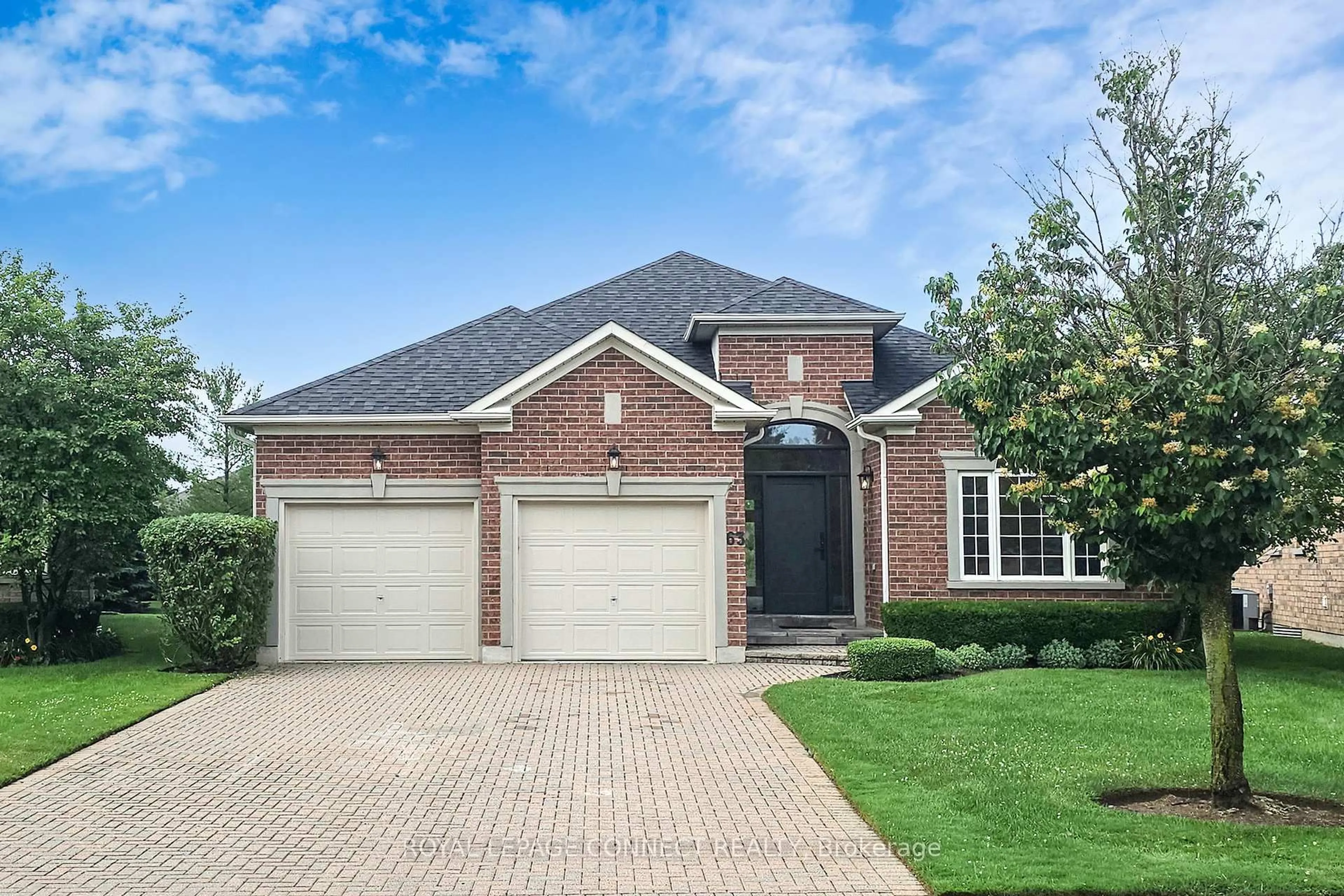 Home with brick exterior material, street for 63 Turn Taylor, Whitchurch-Stouffville Ontario L4A 1R3