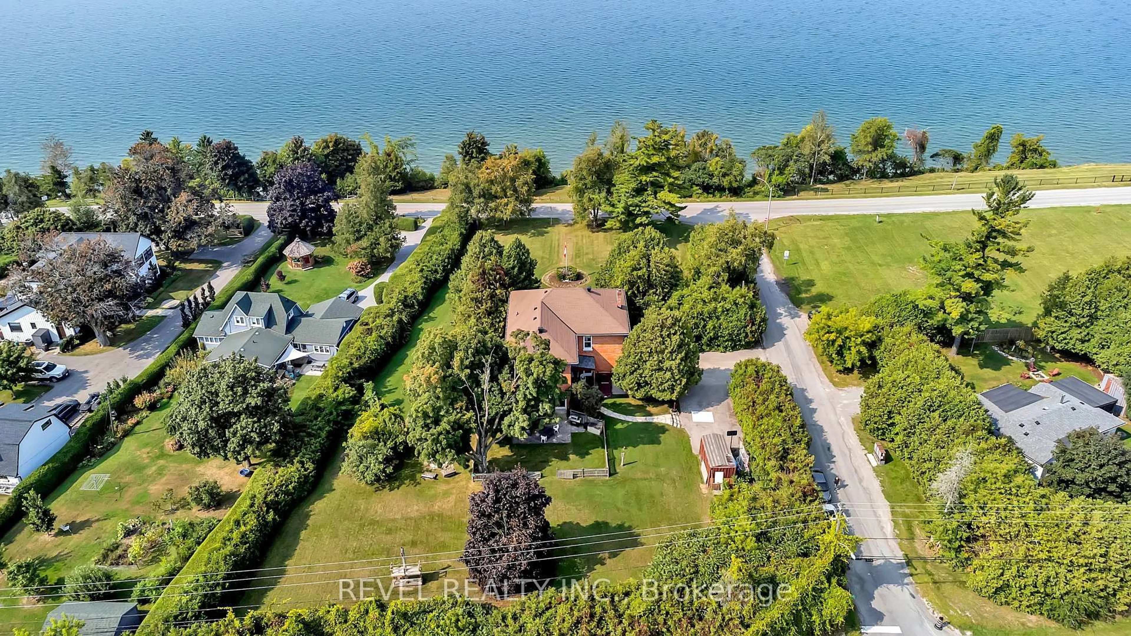 A pic from outside/outdoor area/front of a property/back of a property/a pic from drone, water/lake/river/ocean view for 351 Hedge Rd, Georgina Ontario L0E 1R0