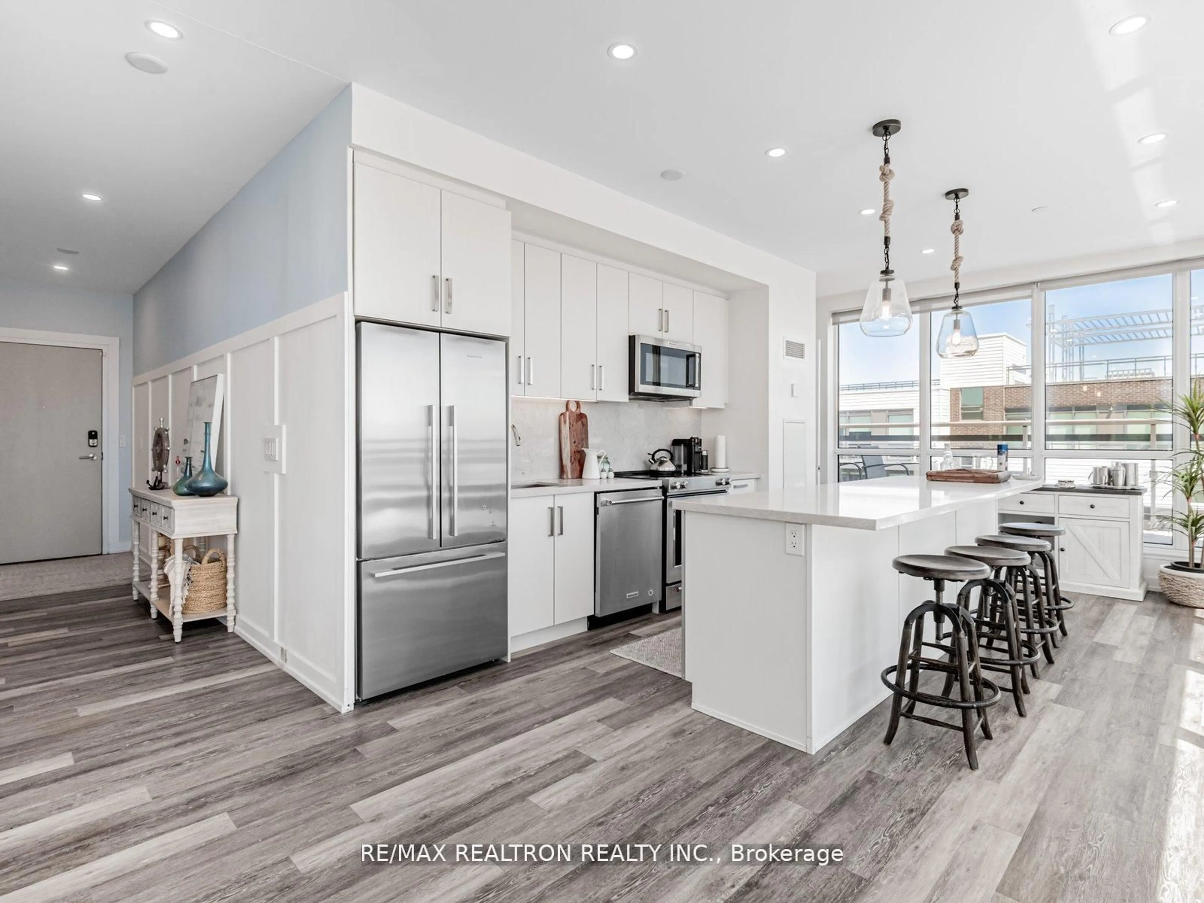 Open concept kitchen, ceramic/tile floor for 241 Sea Ray Ave #A407, Innisfil Ontario L9S 0J9