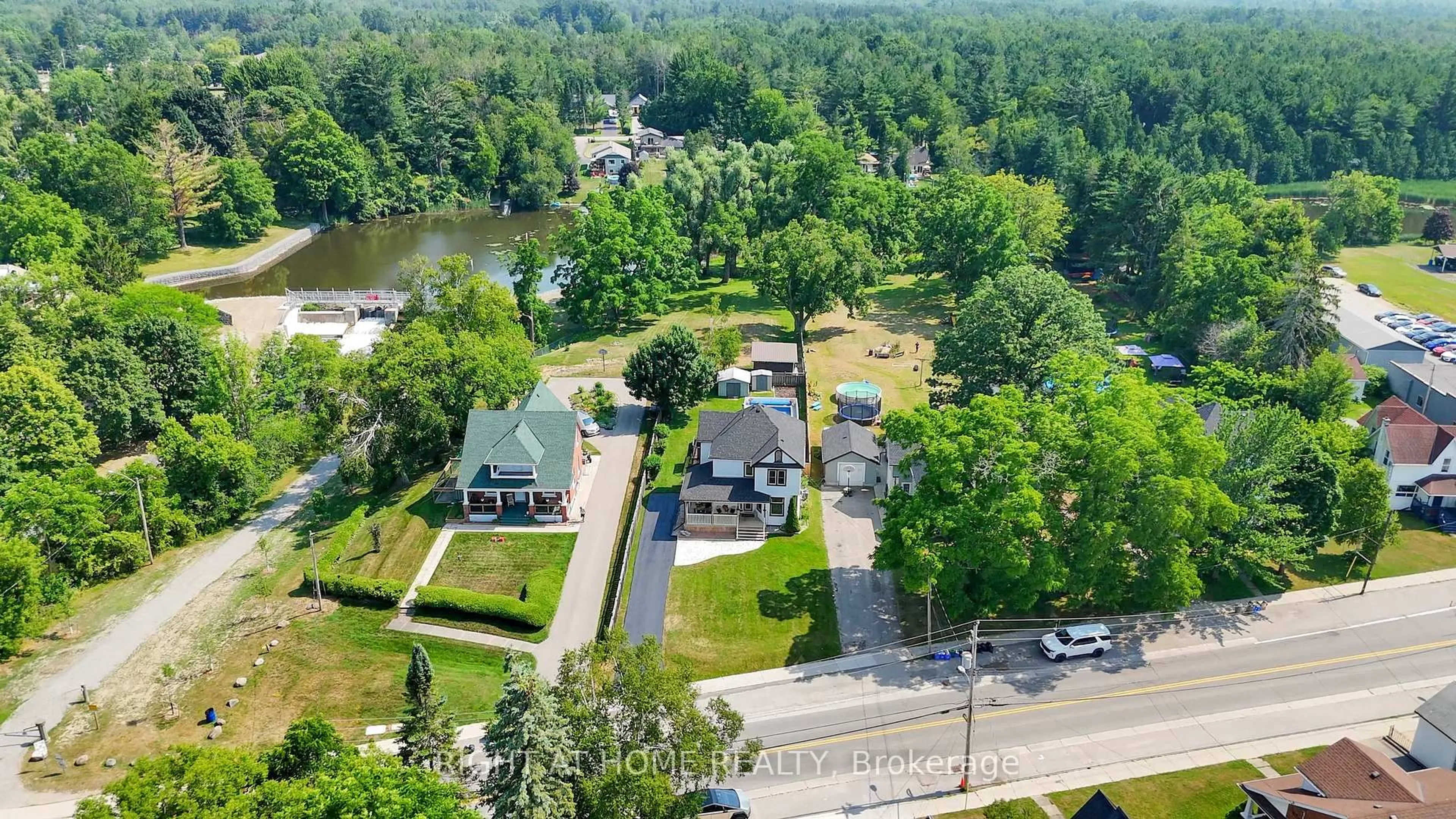 A pic from outside/outdoor area/front of a property/back of a property/a pic from drone, water/lake/river/ocean view for 235 Pefferlaw Rd, Georgina Ontario L0E 1N0