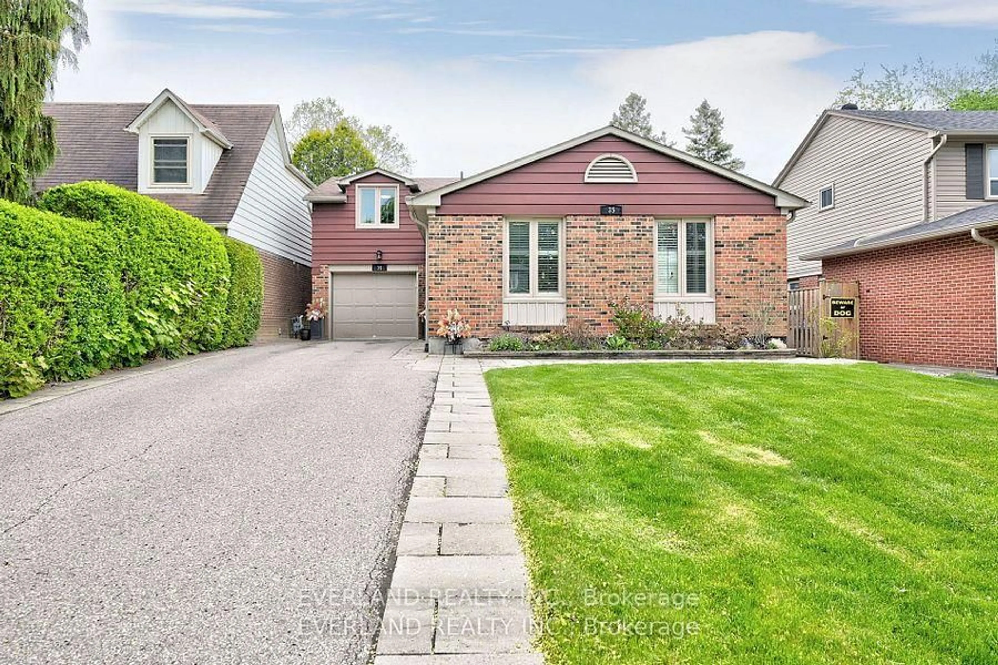 Home with brick exterior material, street for 35 Ravengloss Dr, Markham Ontario L3T 4C8