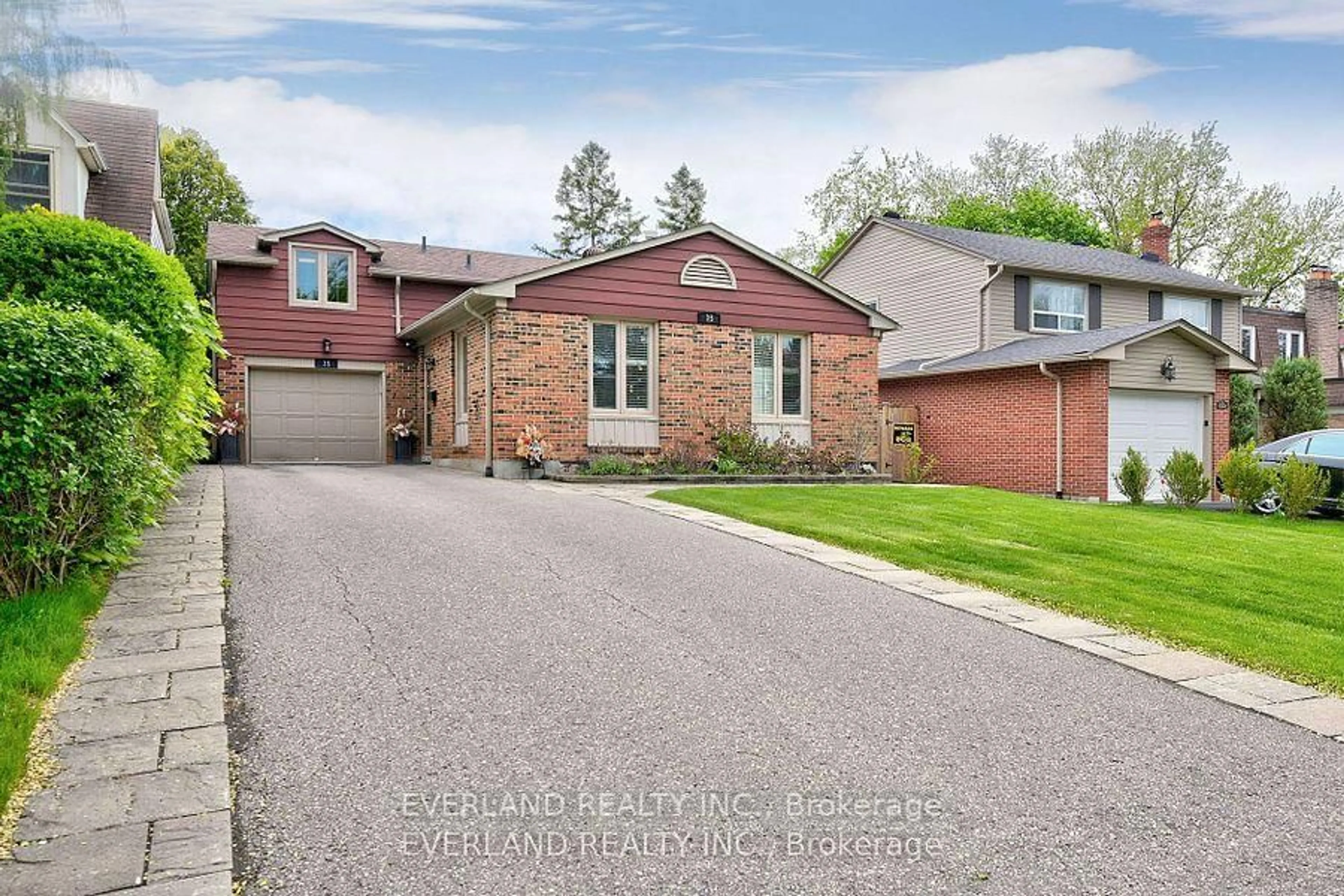 Home with brick exterior material, street for 35 Ravengloss Dr, Markham Ontario L3T 4C8