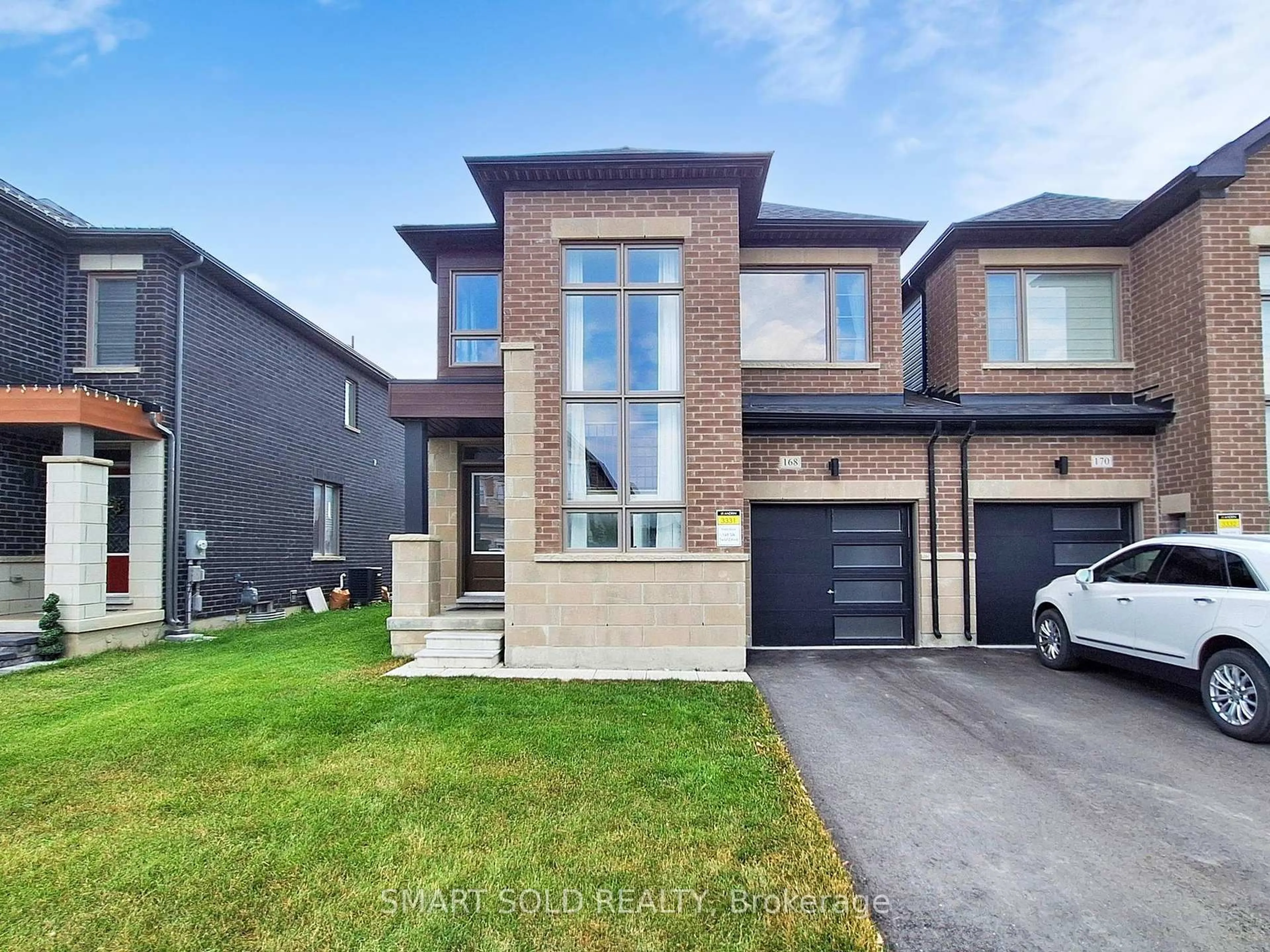 Home with brick exterior material, street for 168 Silk Twist Dr, East Gwillimbury Ontario L9N 0V7
