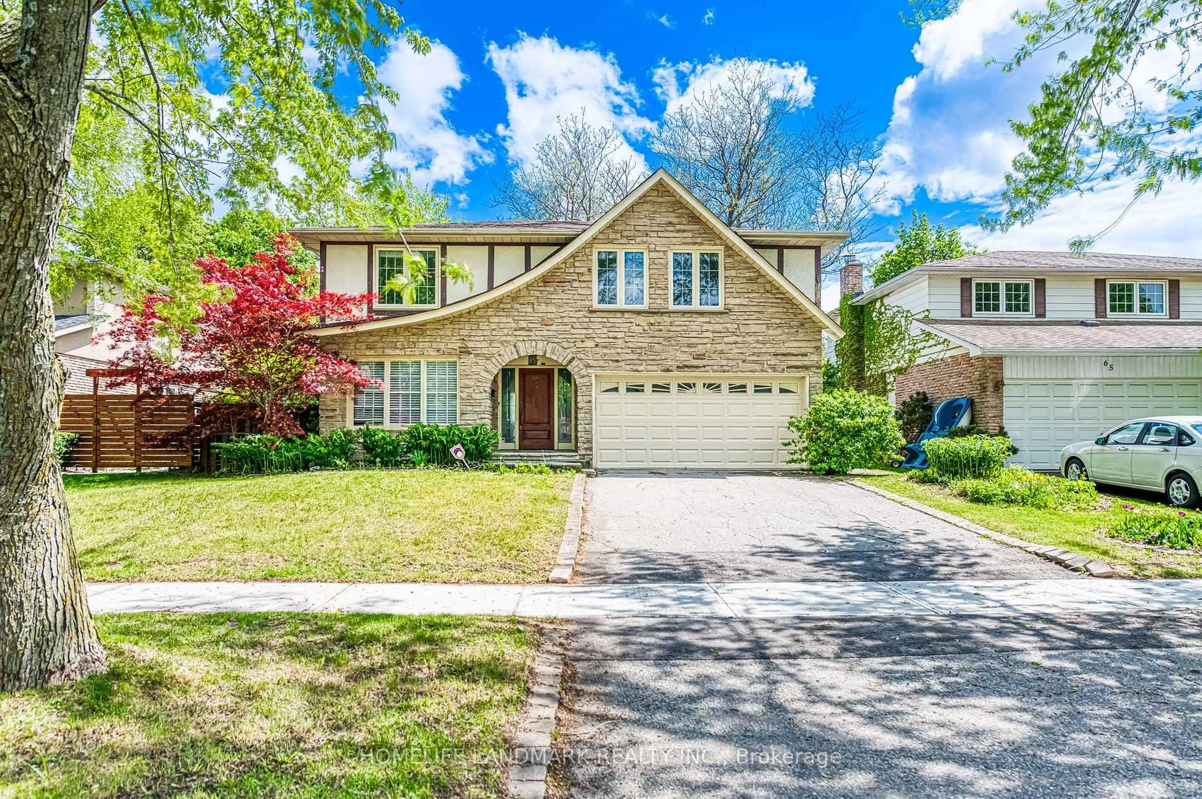 Home with vinyl exterior material, street for 67 Carlton Rd, Markham Ontario L3R 1Z7