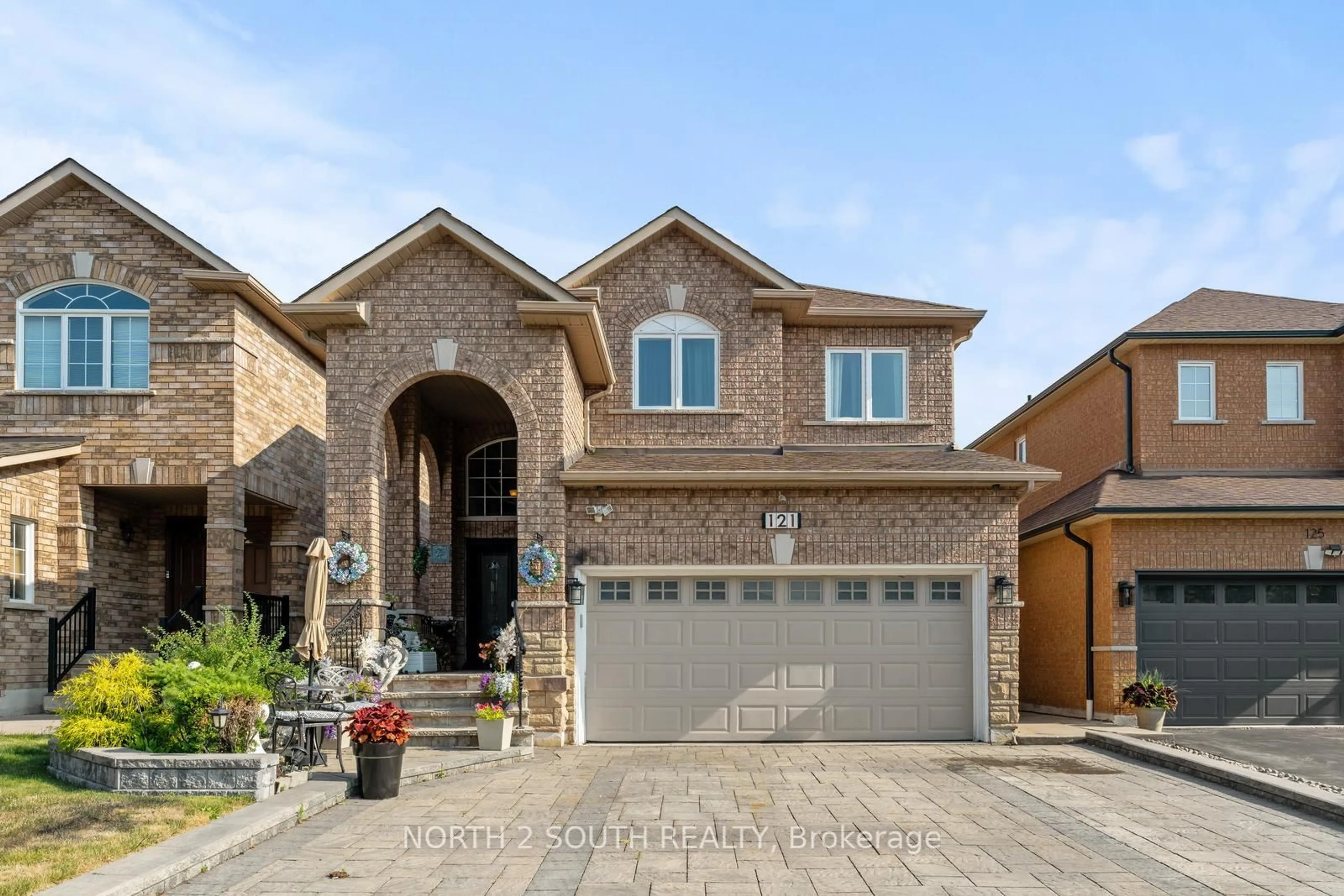 Home with brick exterior material, street for 121 Royal Pine Ave, Vaughan Ontario L4H 1S8