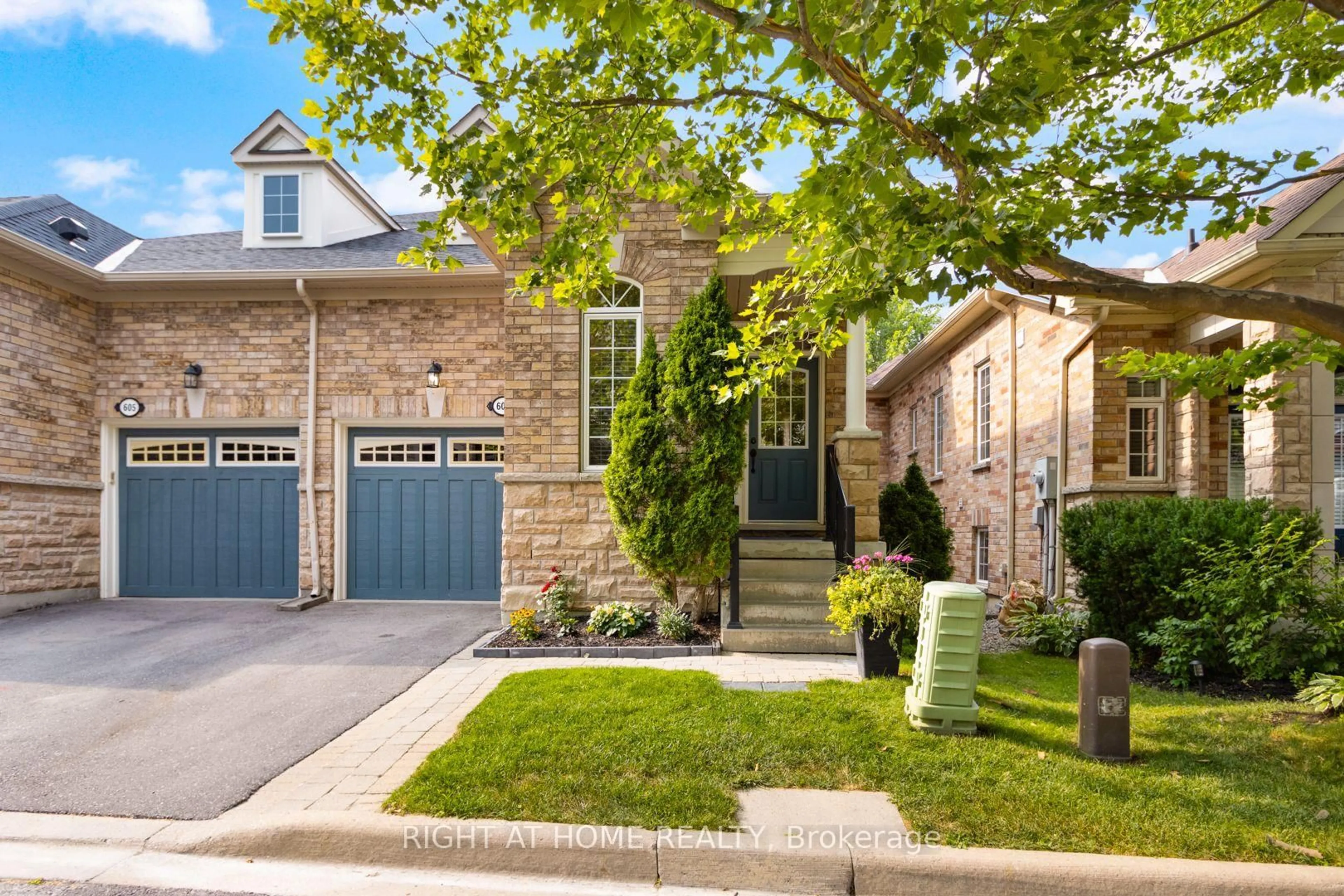 Home with brick exterior material, street for 607 Tapestry Lane, Newmarket Ontario L3X 3C9
